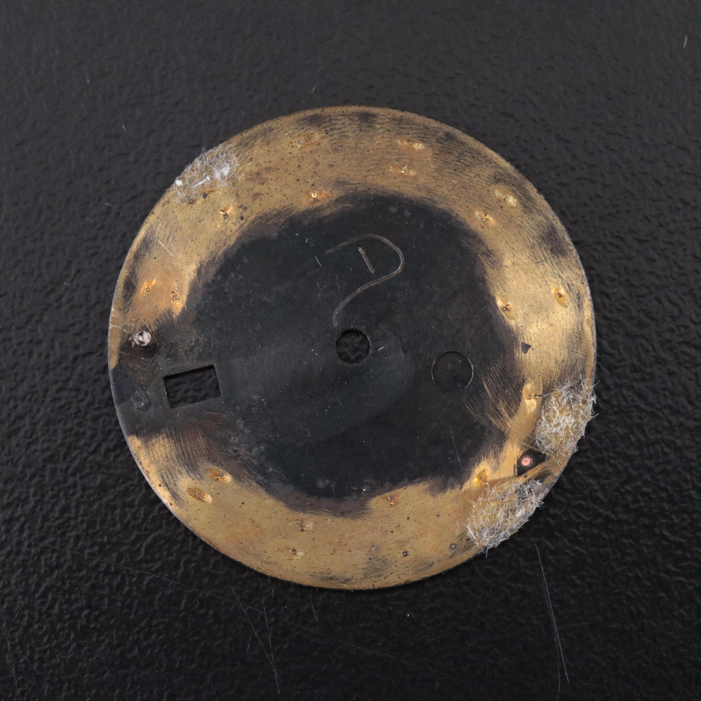 Two Rolex Dials and a Bezel Insert