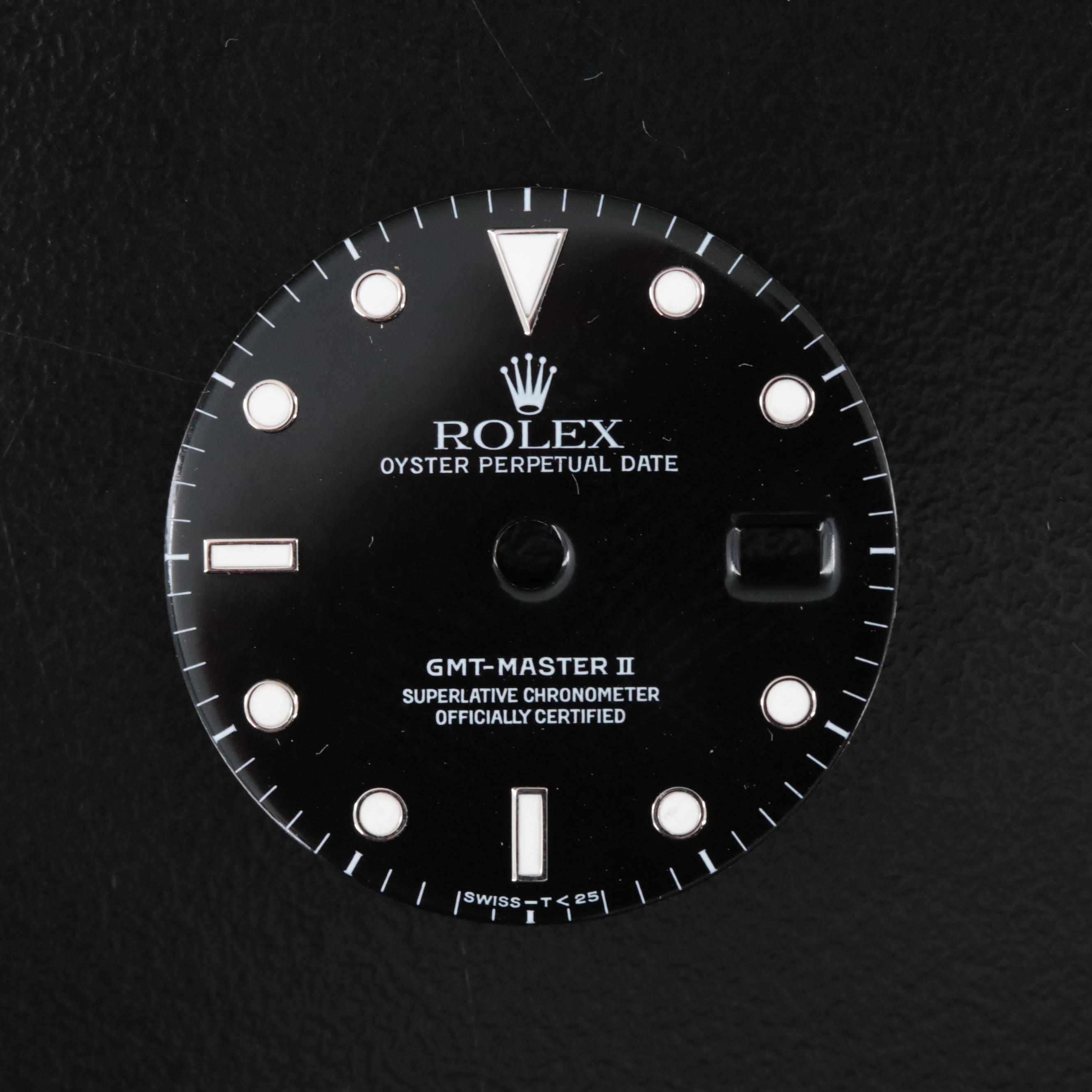 Two Rolex Dials and a Bezel Insert