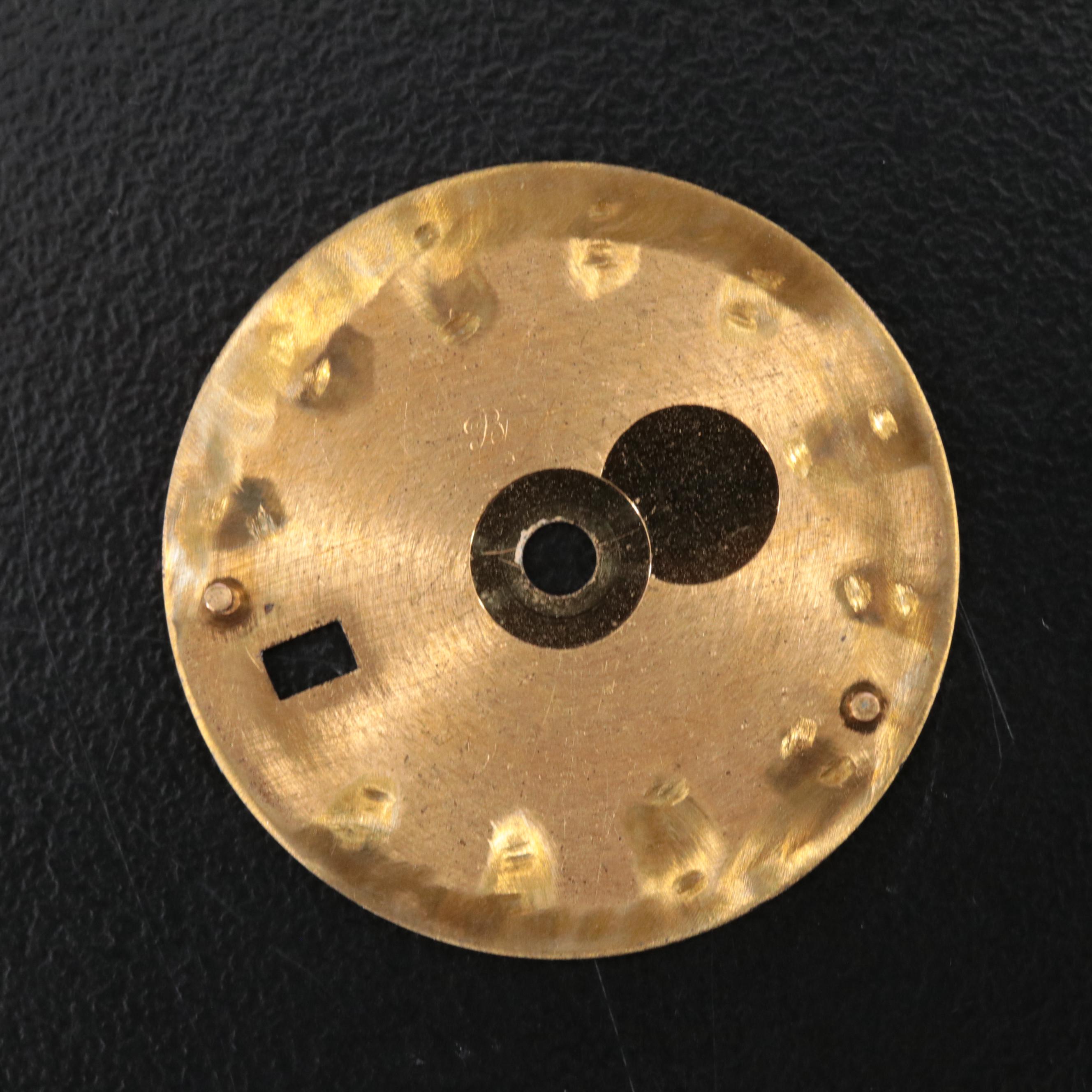 Two Rolex Dials and a Bezel Insert