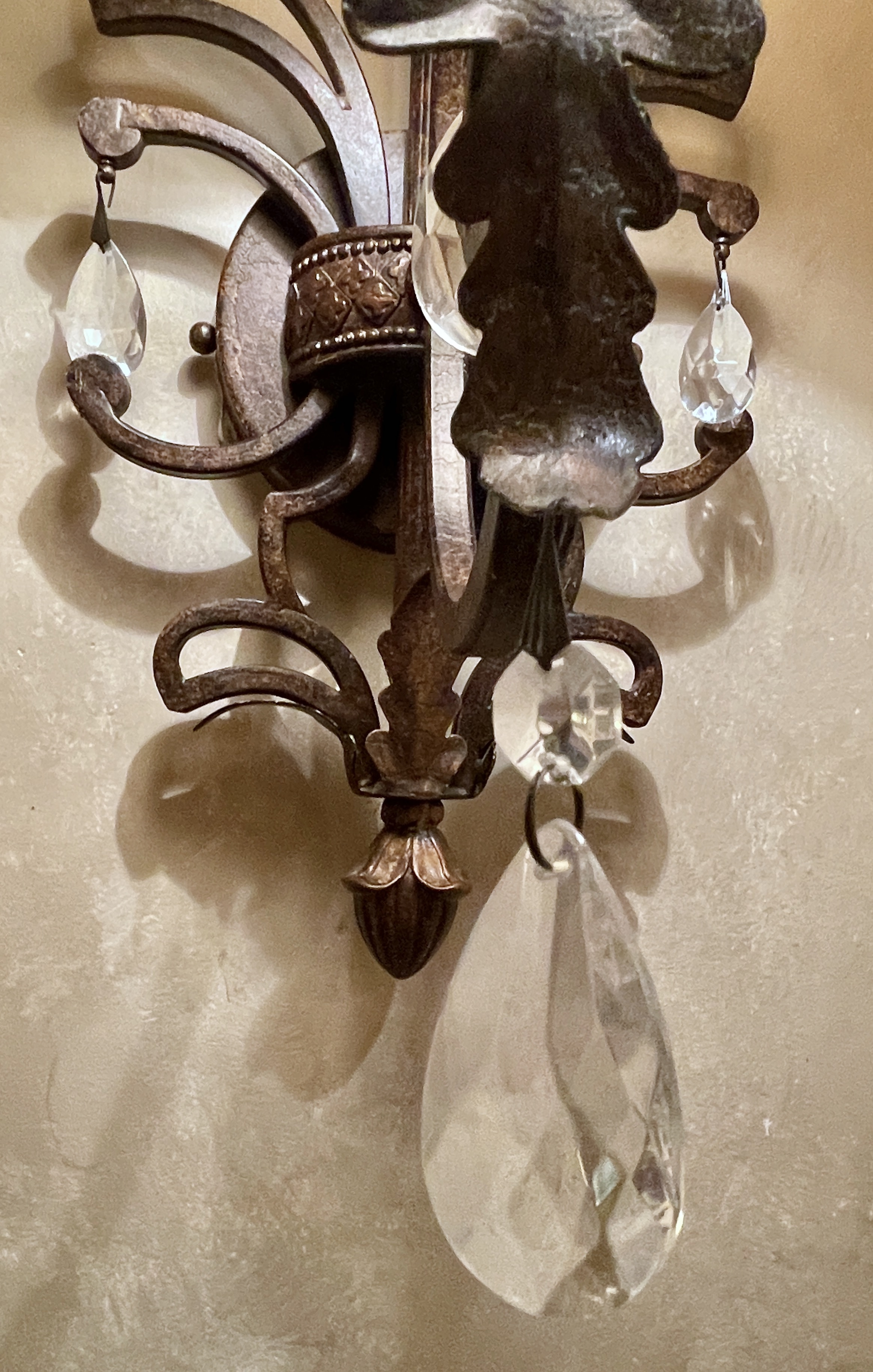 Pair of Antiqued Metal Wall Sconces with Decorative Wall Plates