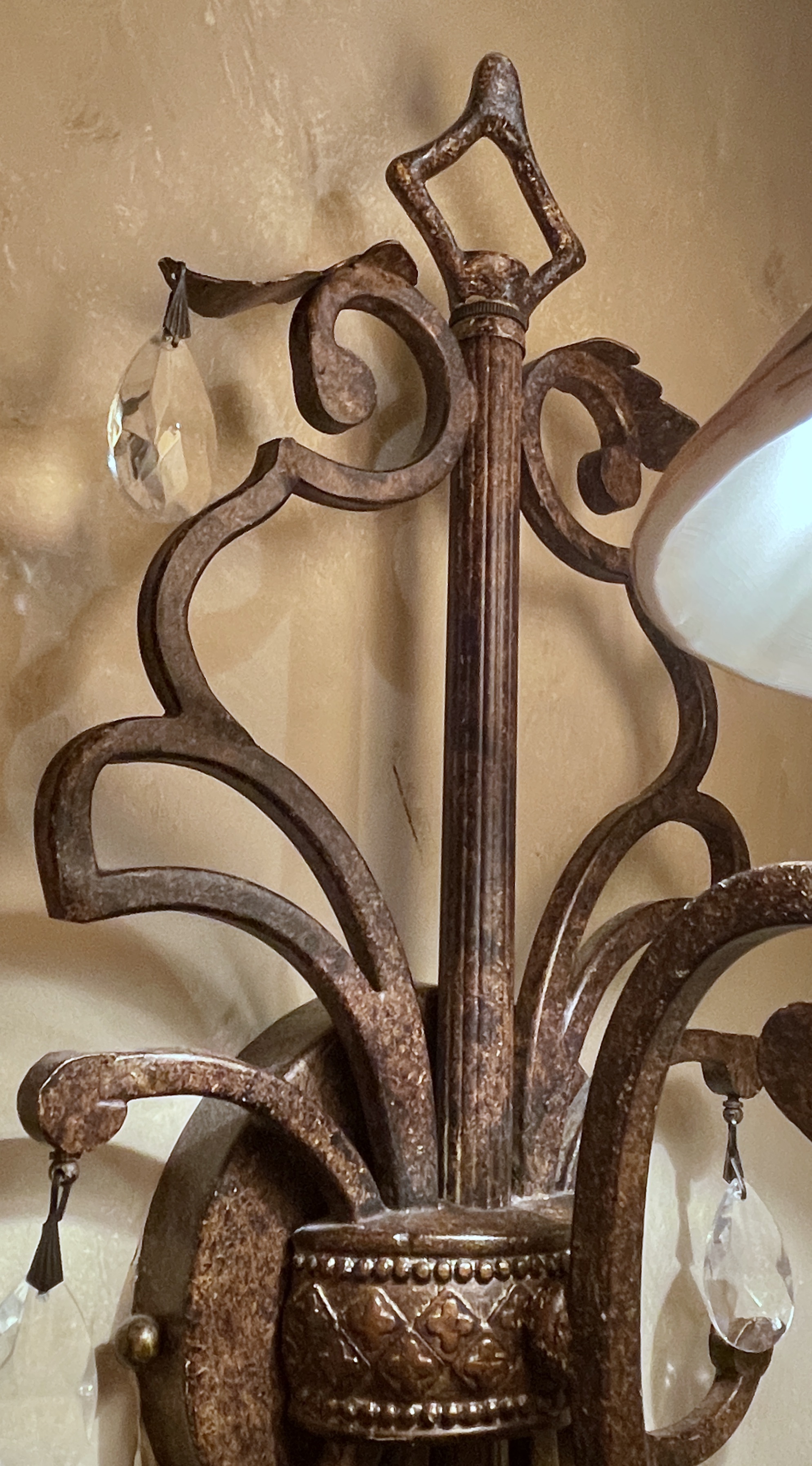 Pair of Antiqued Metal Wall Sconces with Decorative Wall Plates