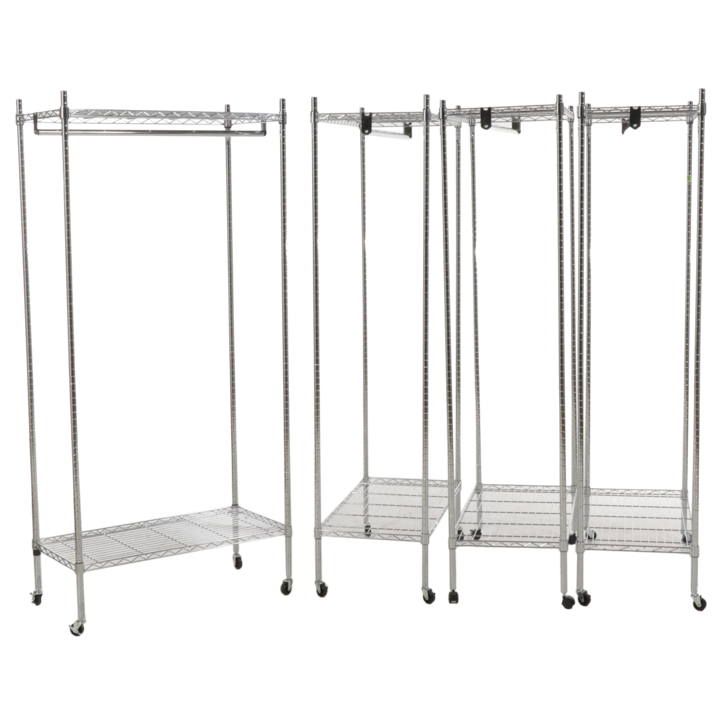 Four Chromed Metal Rolling Garment Racks
