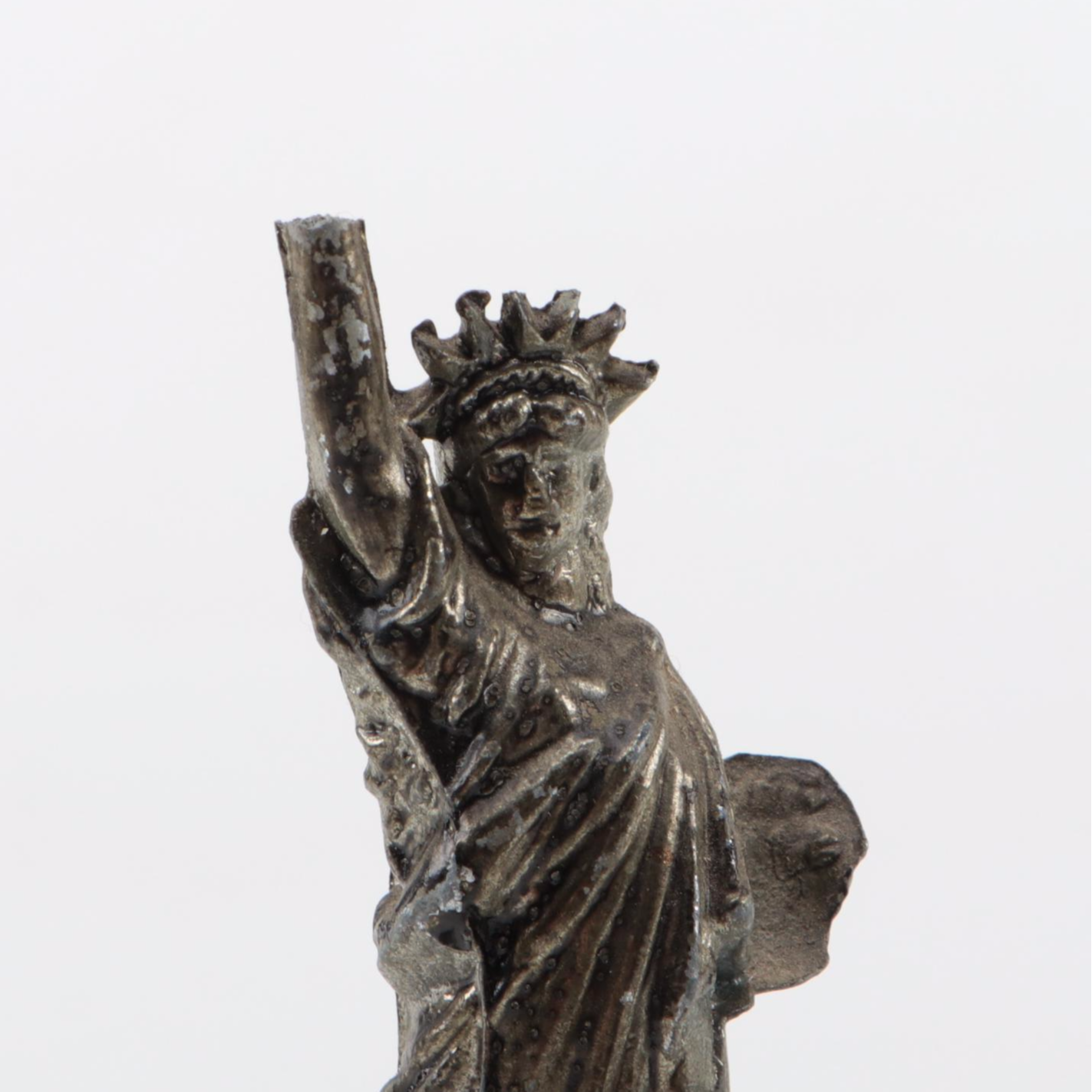 Hudson and Other Pewter Figurines and Shakers with Mother-of -Pearl Buttons