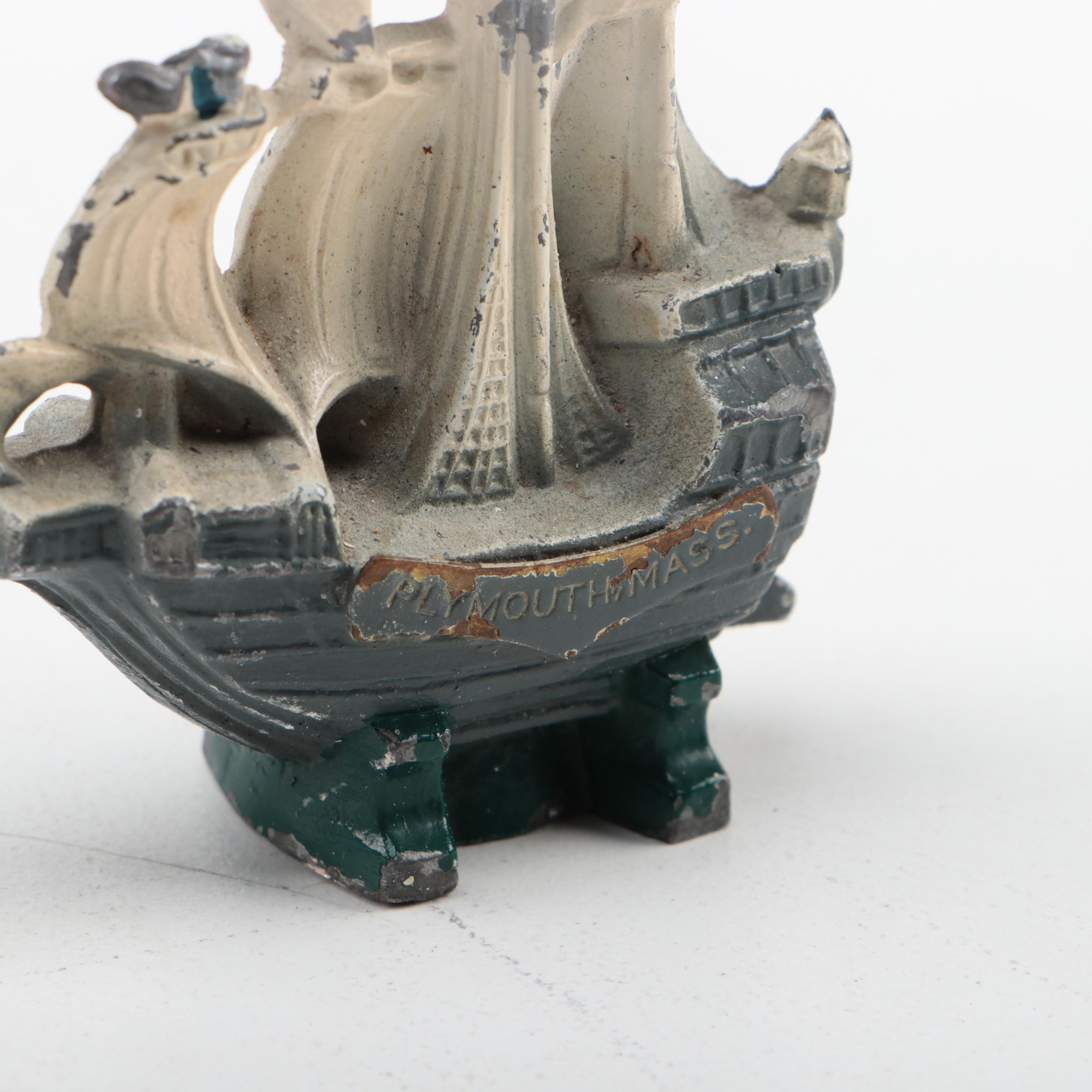 Hudson and Other Pewter Figurines and Shakers with Mother-of -Pearl Buttons