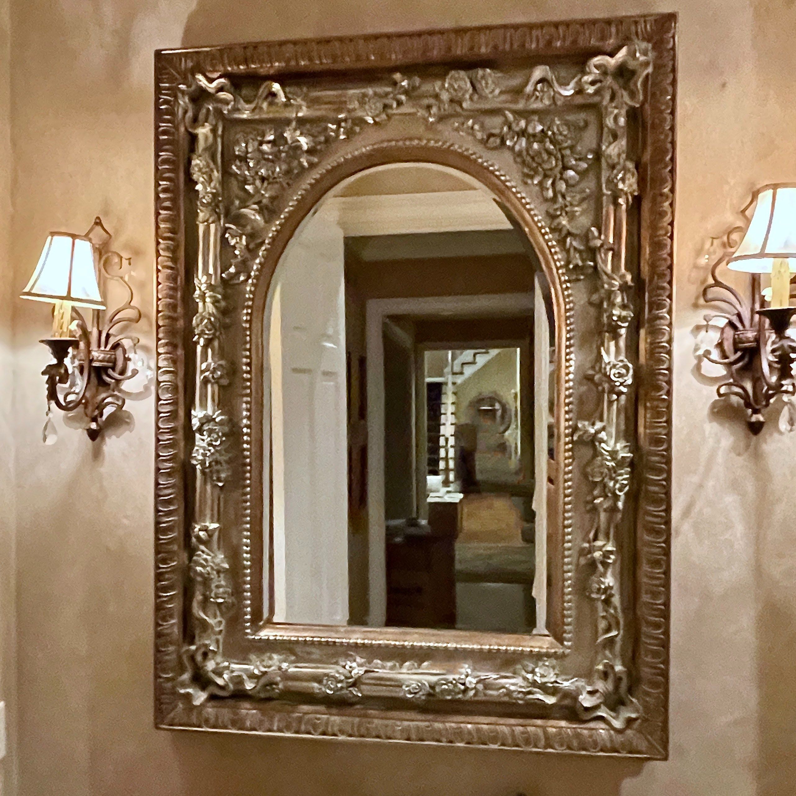 Pair of Antiqued Metal Wall Sconces with Decorative Wall Plates