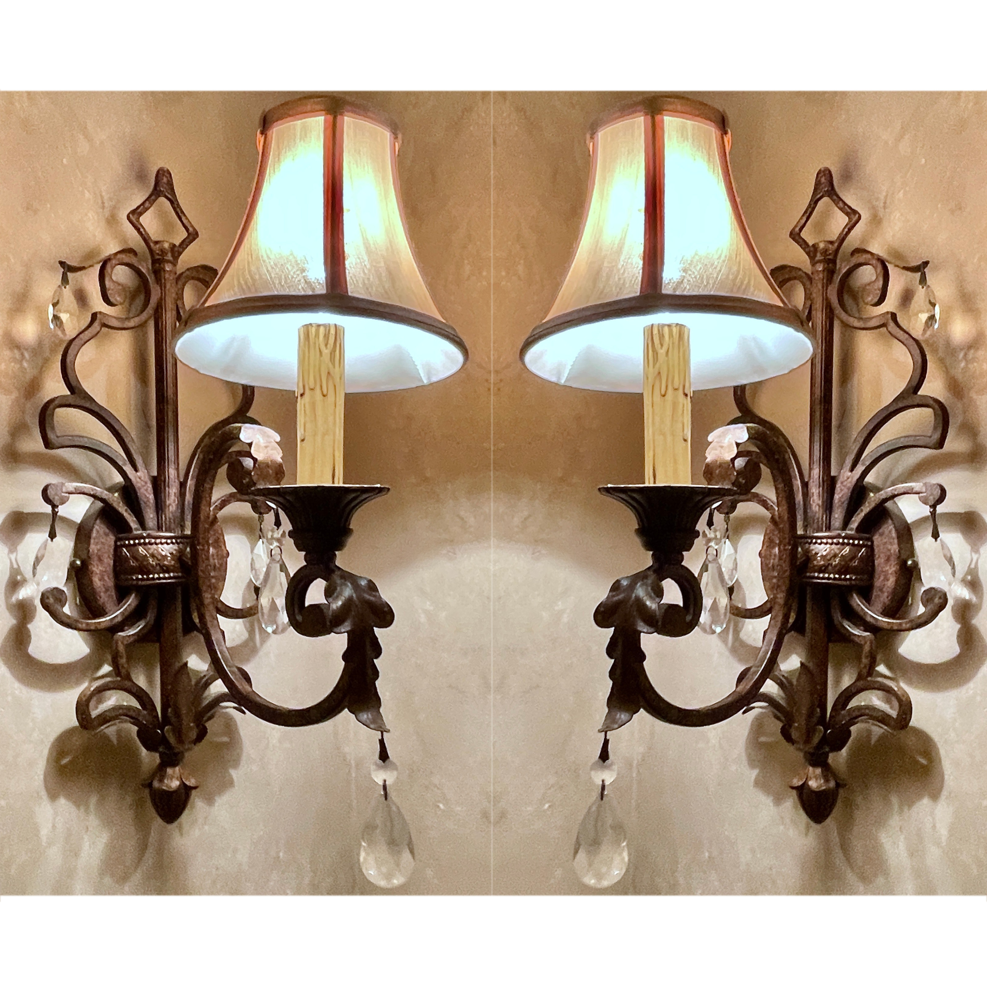 Pair of Antiqued Metal Wall Sconces with Decorative Wall Plates