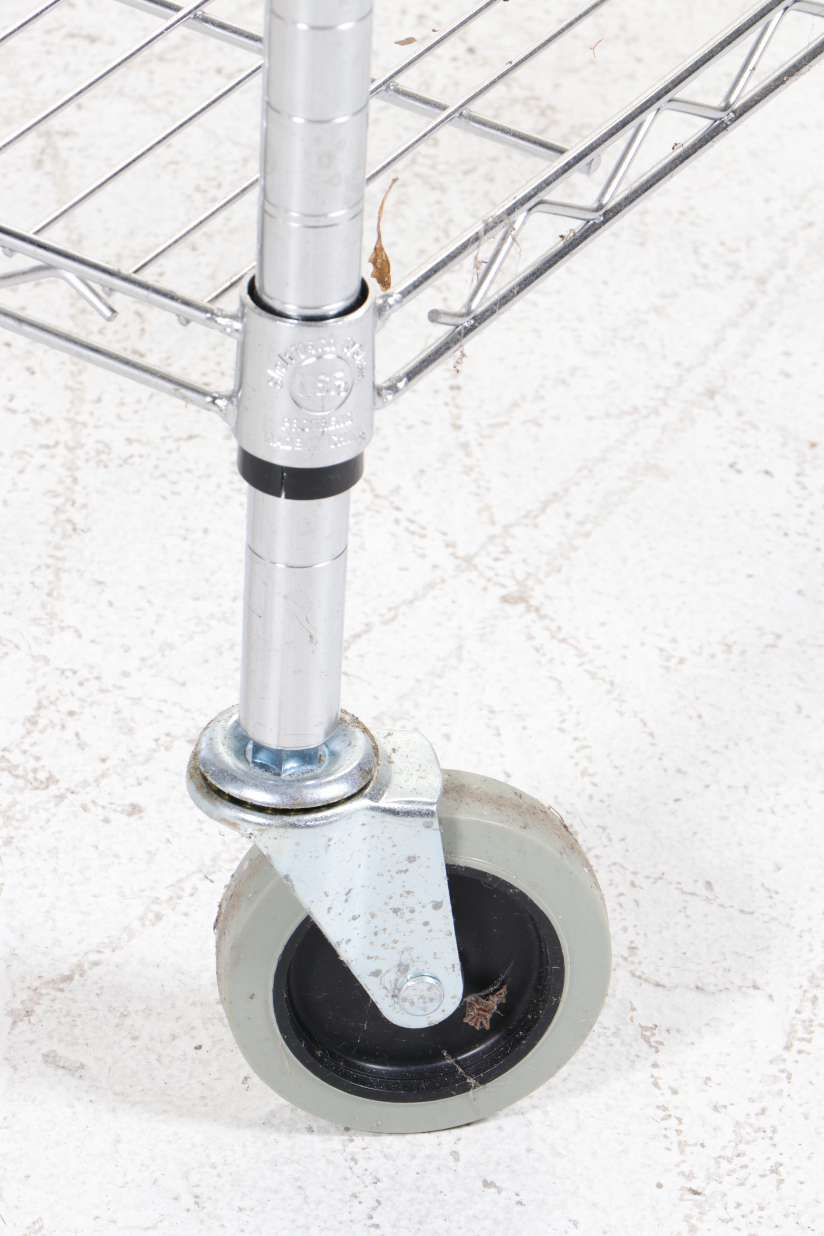 Three Chrome Finished Metal Rolling Racks