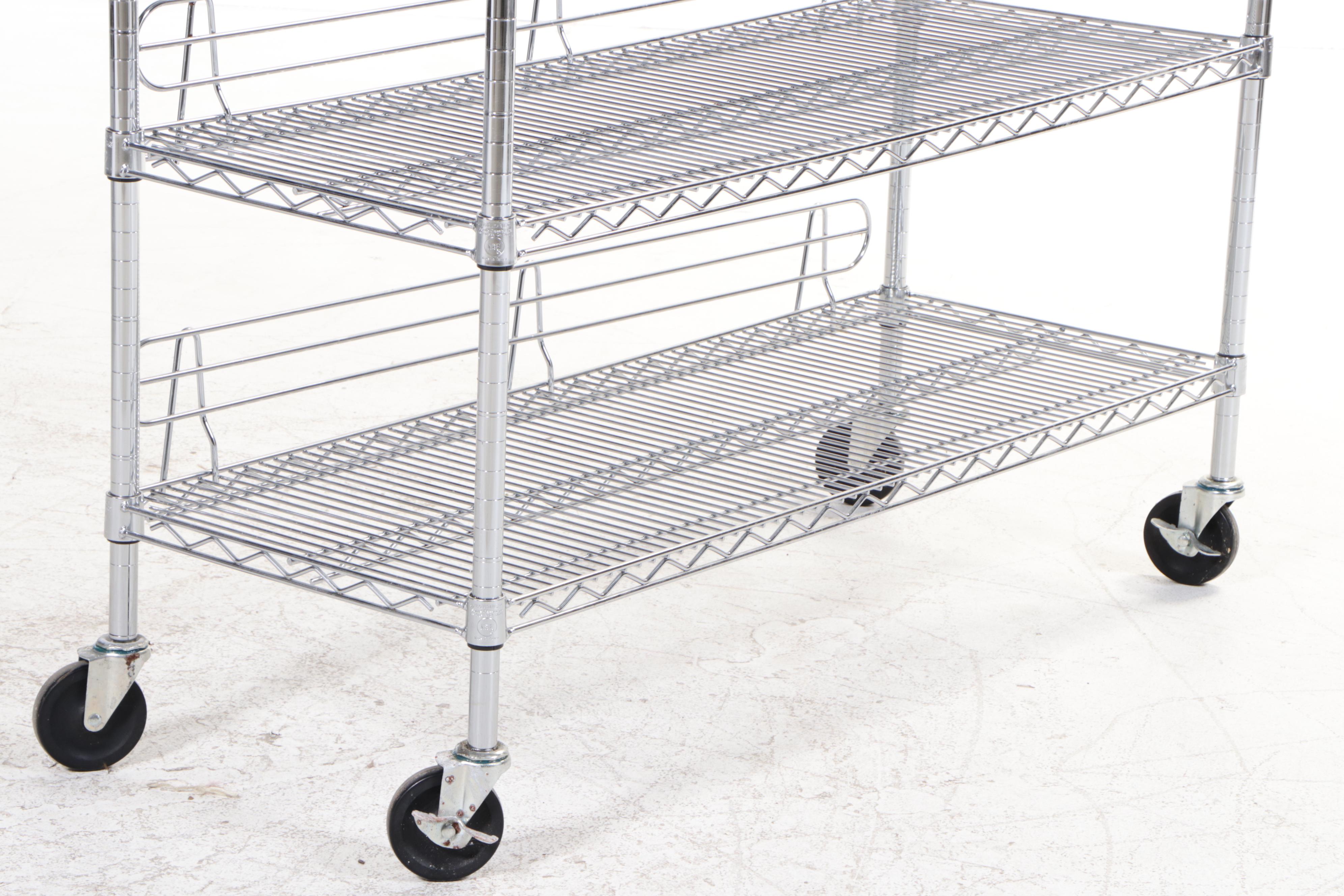 Three Chrome Finished Metal Rolling Racks