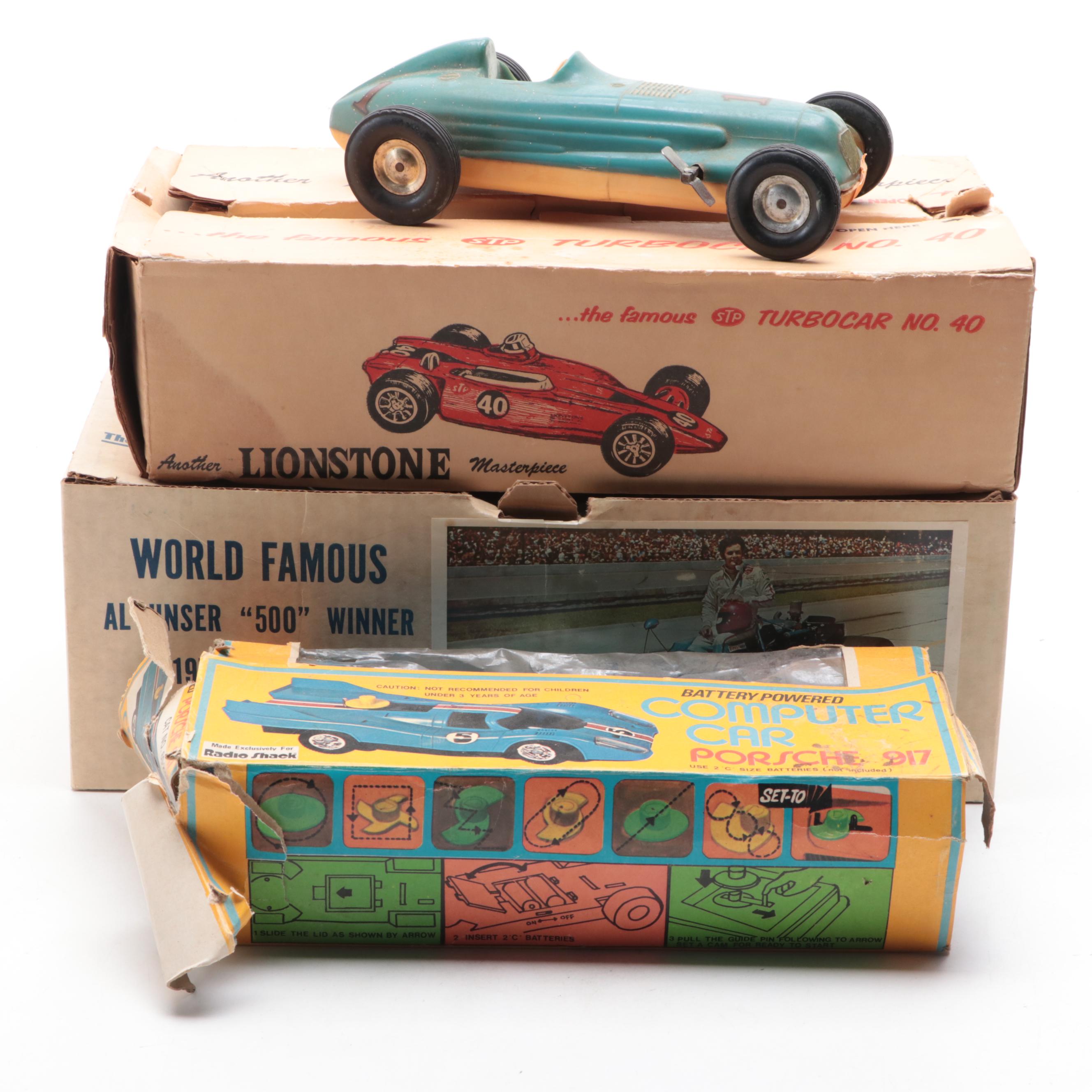 Lionstone Whiskey Race Car Decanters with Tandy Porsche 917, Other Toy Cars