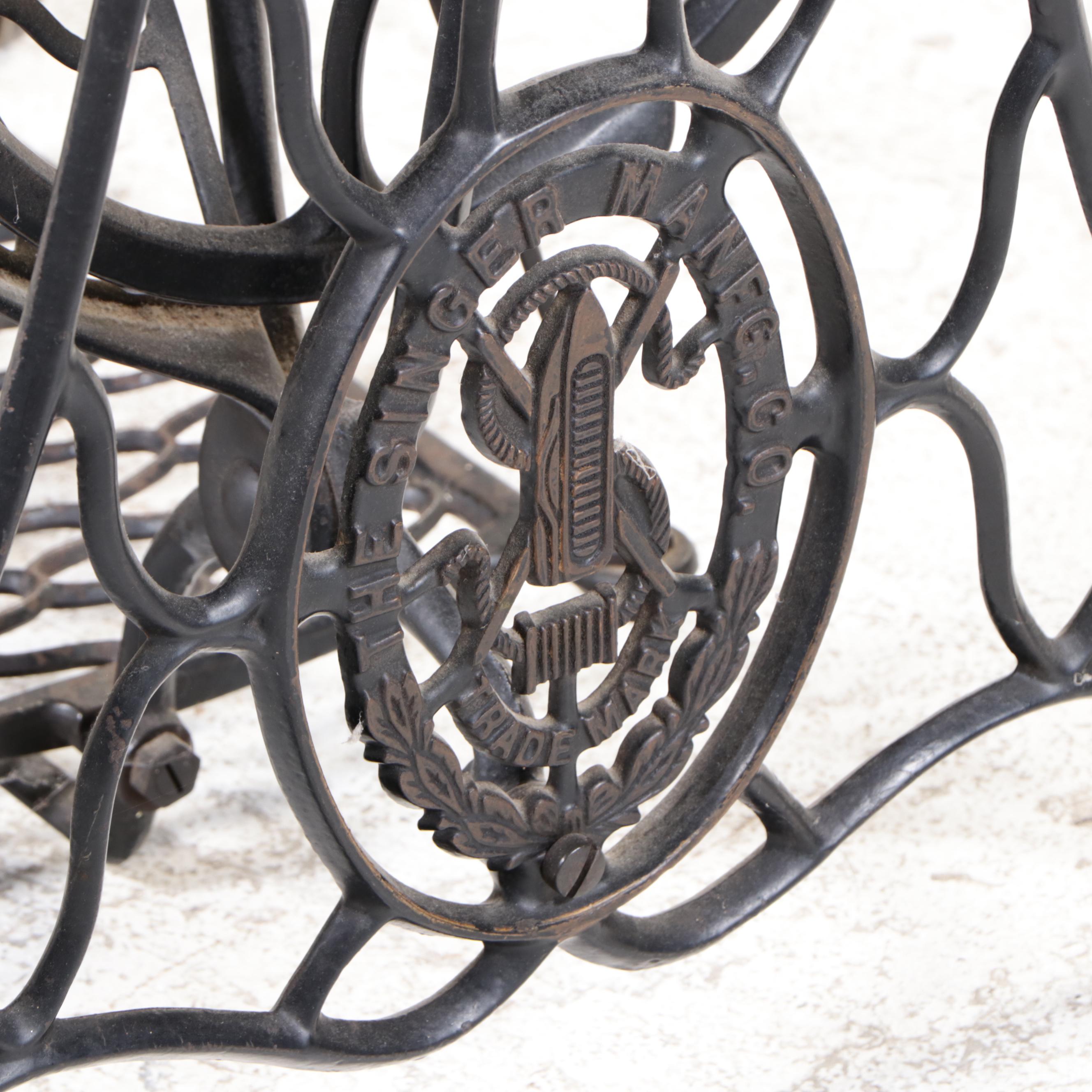 Singer Model 66 Red-Eye Sewing Machine, Oak and Cast Iron Treadle Cabinet, 1920s