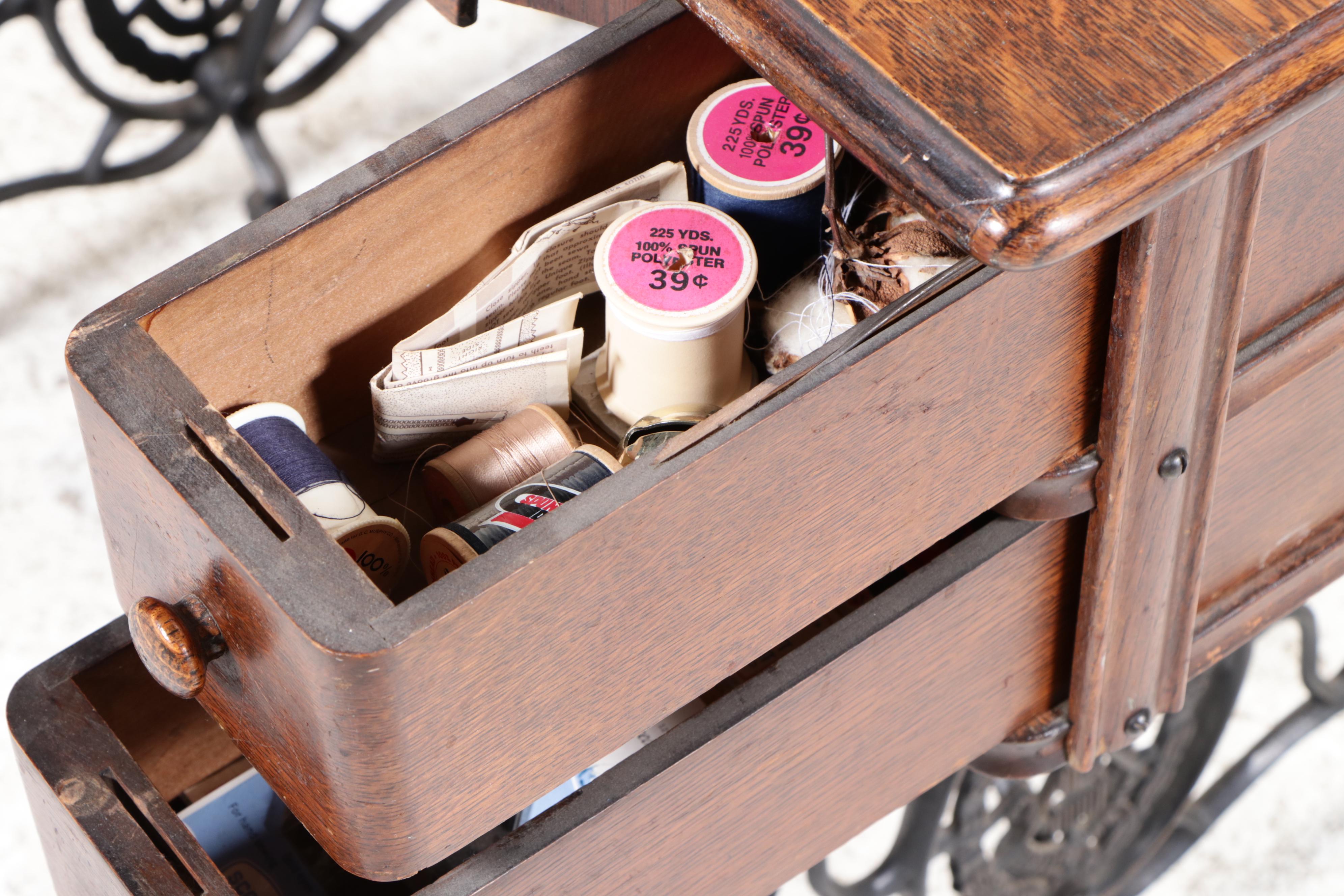 Singer Model 66 Red-Eye Sewing Machine, Oak and Cast Iron Treadle Cabinet, 1920s