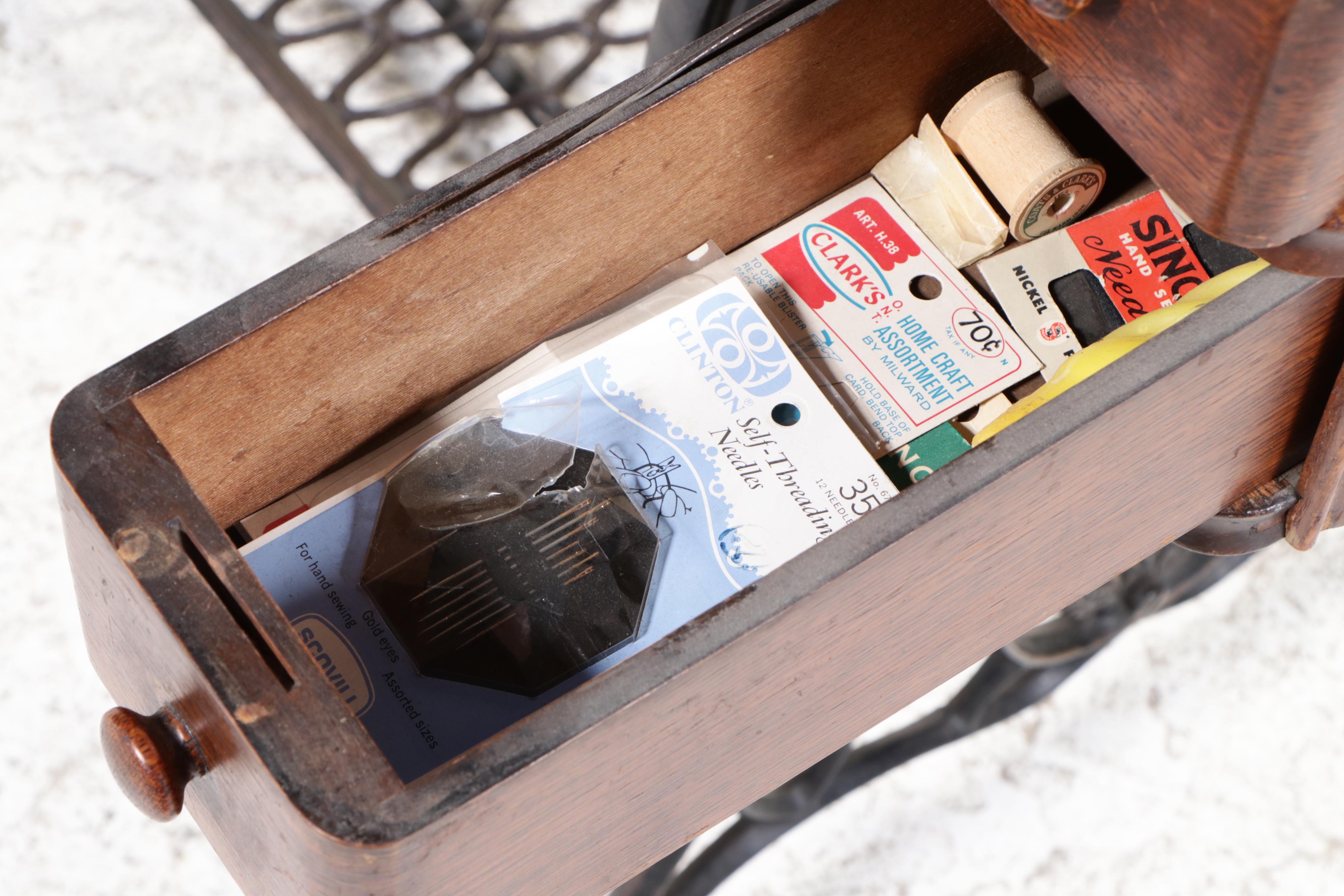 Singer Model 66 Red-Eye Sewing Machine, Oak and Cast Iron Treadle Cabinet, 1920s