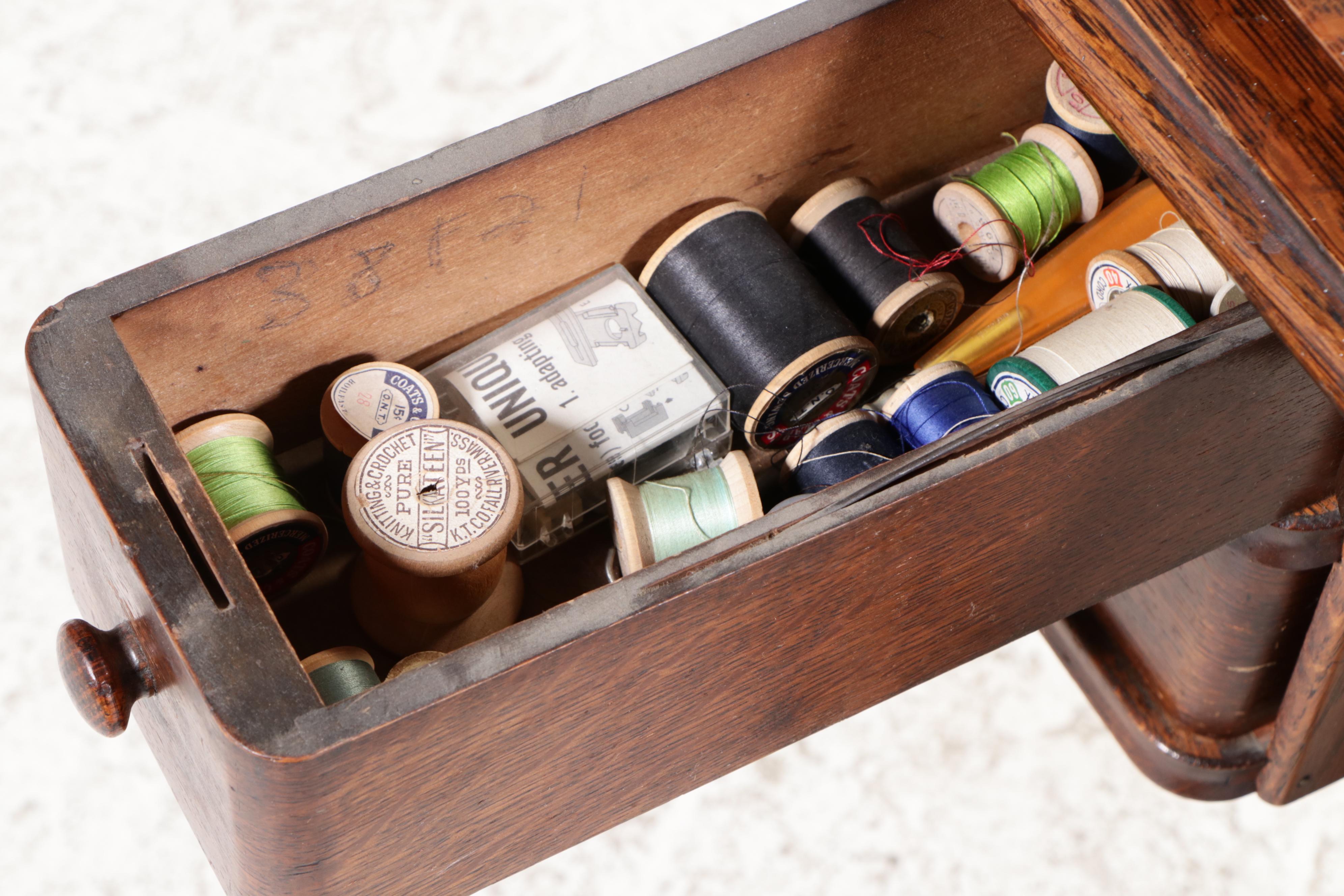 Singer Model 66 Red-Eye Sewing Machine, Oak and Cast Iron Treadle Cabinet, 1920s
