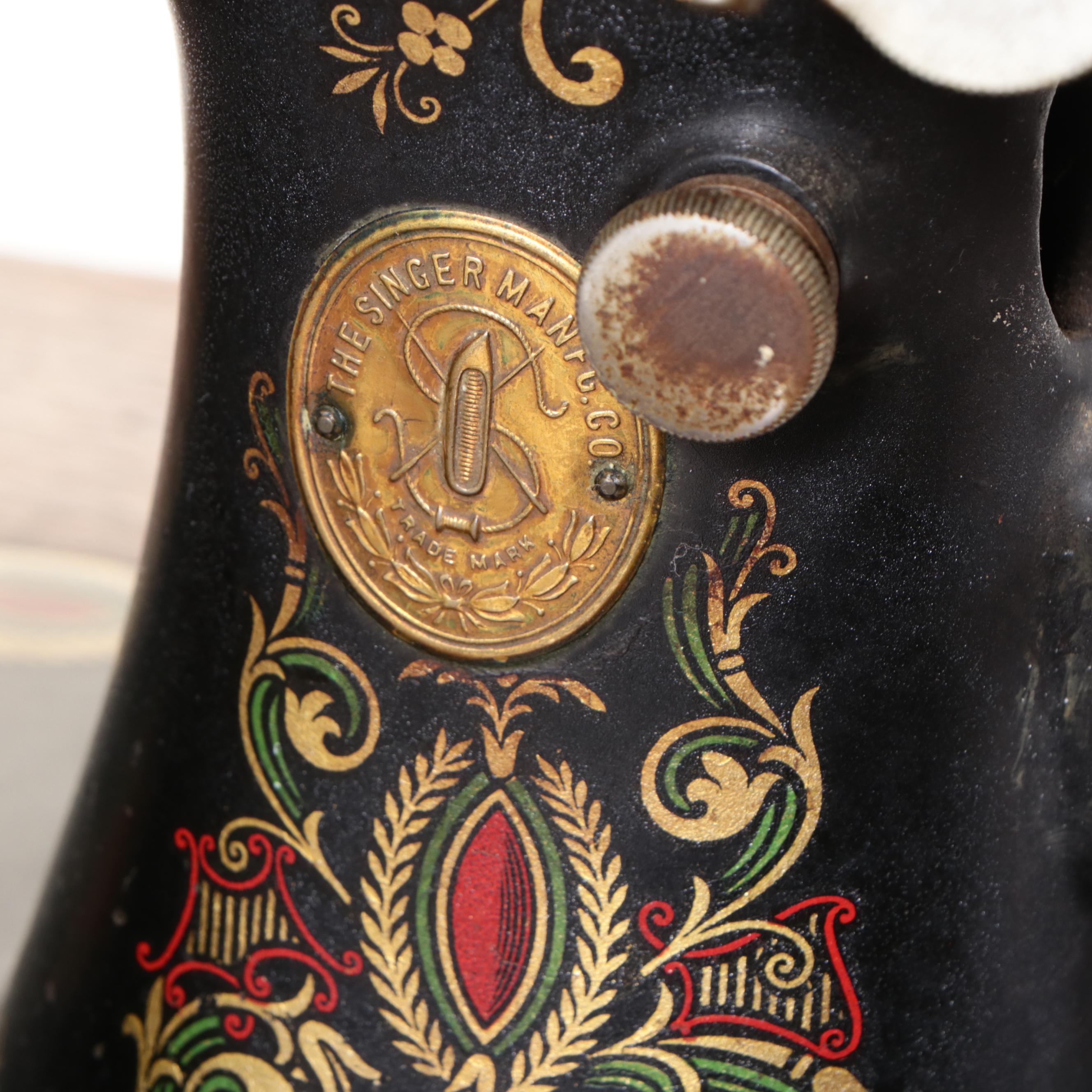 Singer Model 66 Red-Eye Sewing Machine, Oak and Cast Iron Treadle Cabinet, 1920s