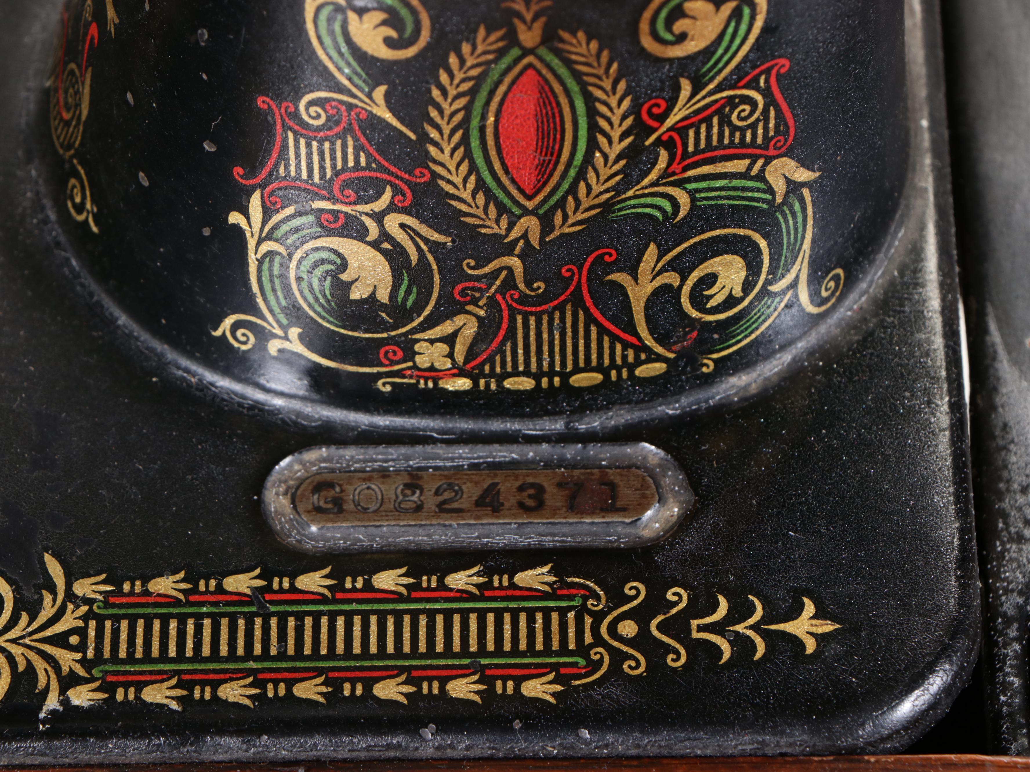 Singer Model 66 Red-Eye Sewing Machine, Oak and Cast Iron Treadle Cabinet, 1920s