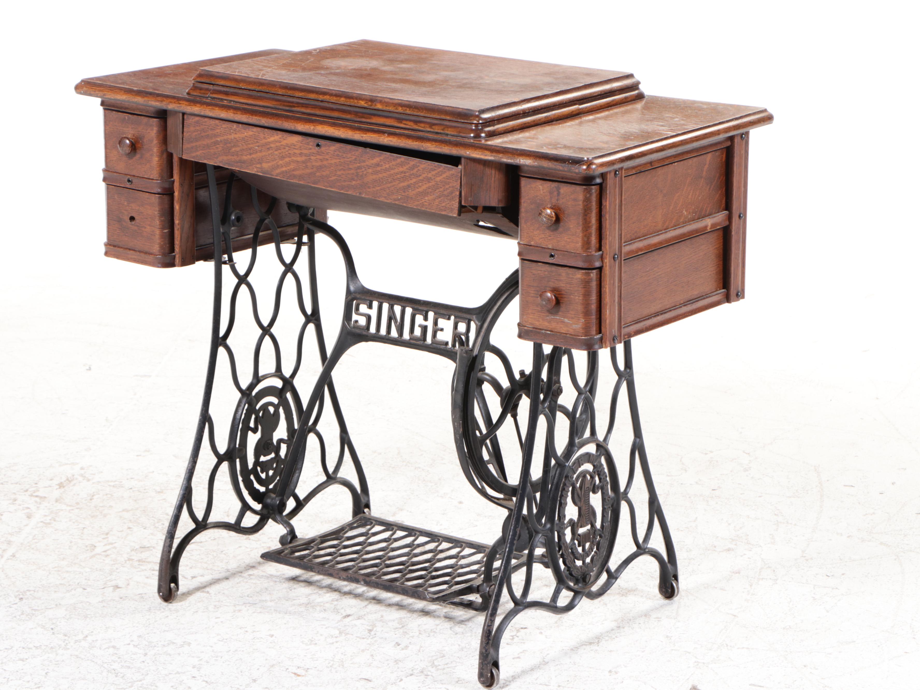 Singer Model 66 Red-Eye Sewing Machine, Oak and Cast Iron Treadle Cabinet, 1920s