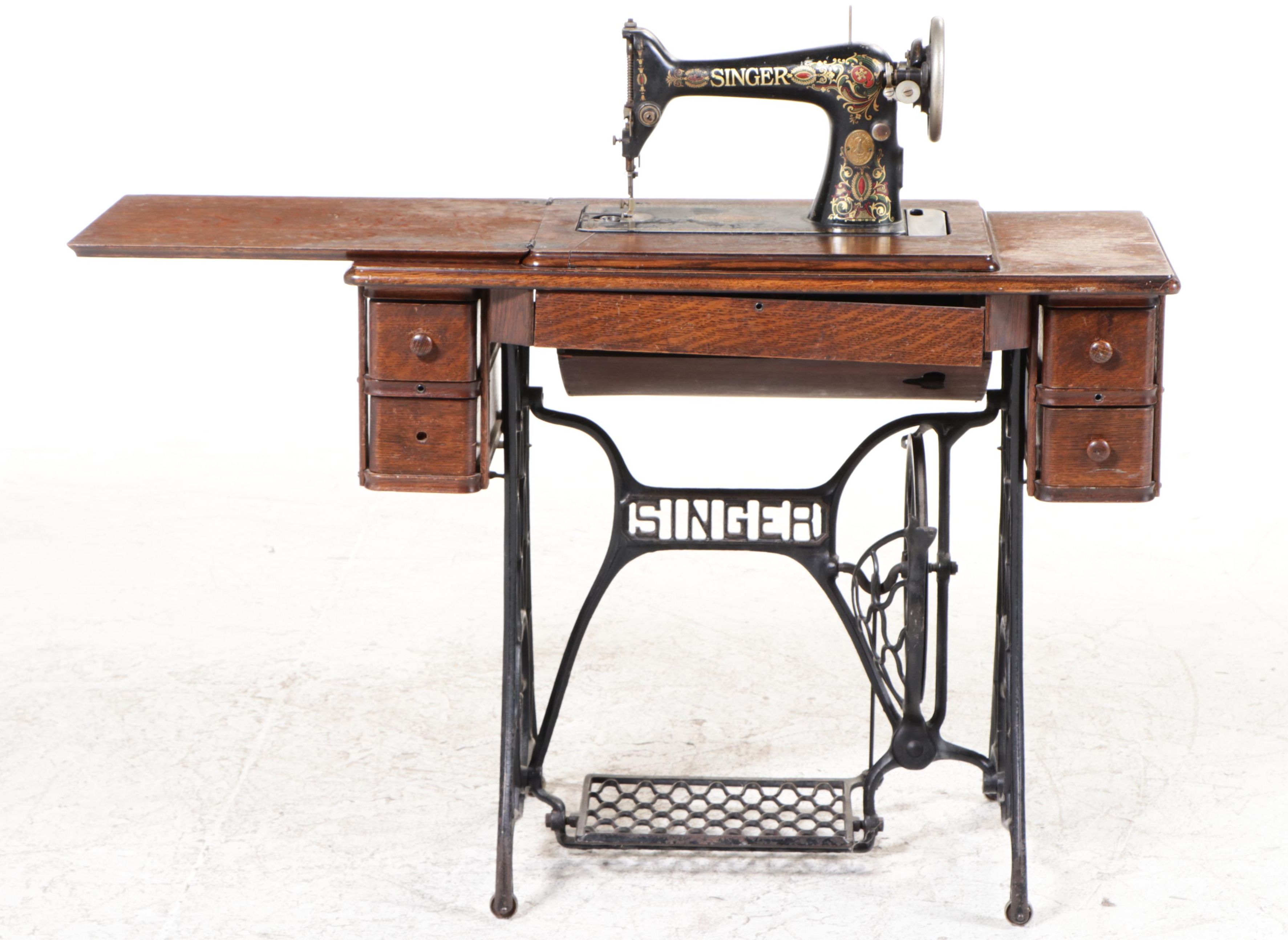 Singer Model 66 Red-Eye Sewing Machine, Oak and Cast Iron Treadle Cabinet, 1920s