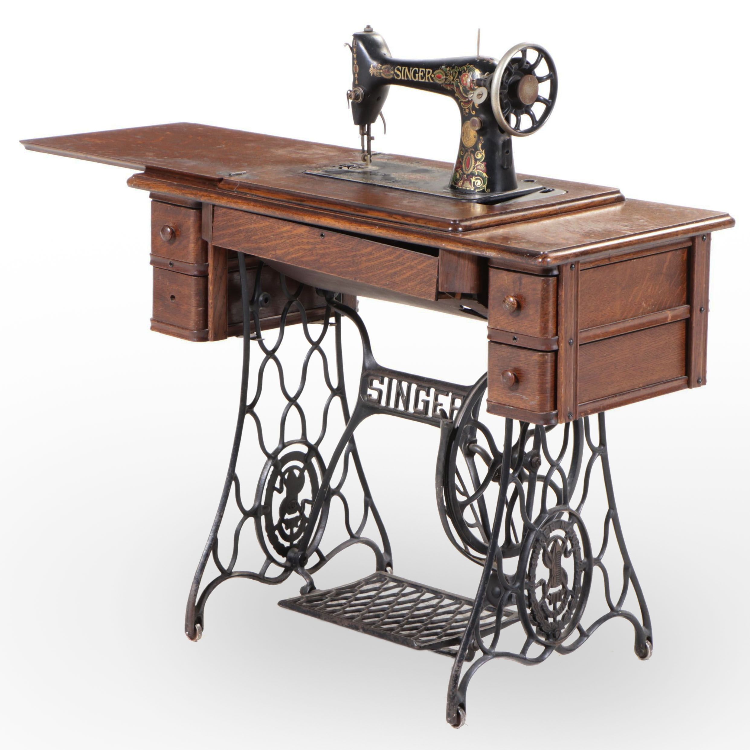Singer Model 66 Red-Eye Sewing Machine, Oak and Cast Iron Treadle Cabinet, 1920s