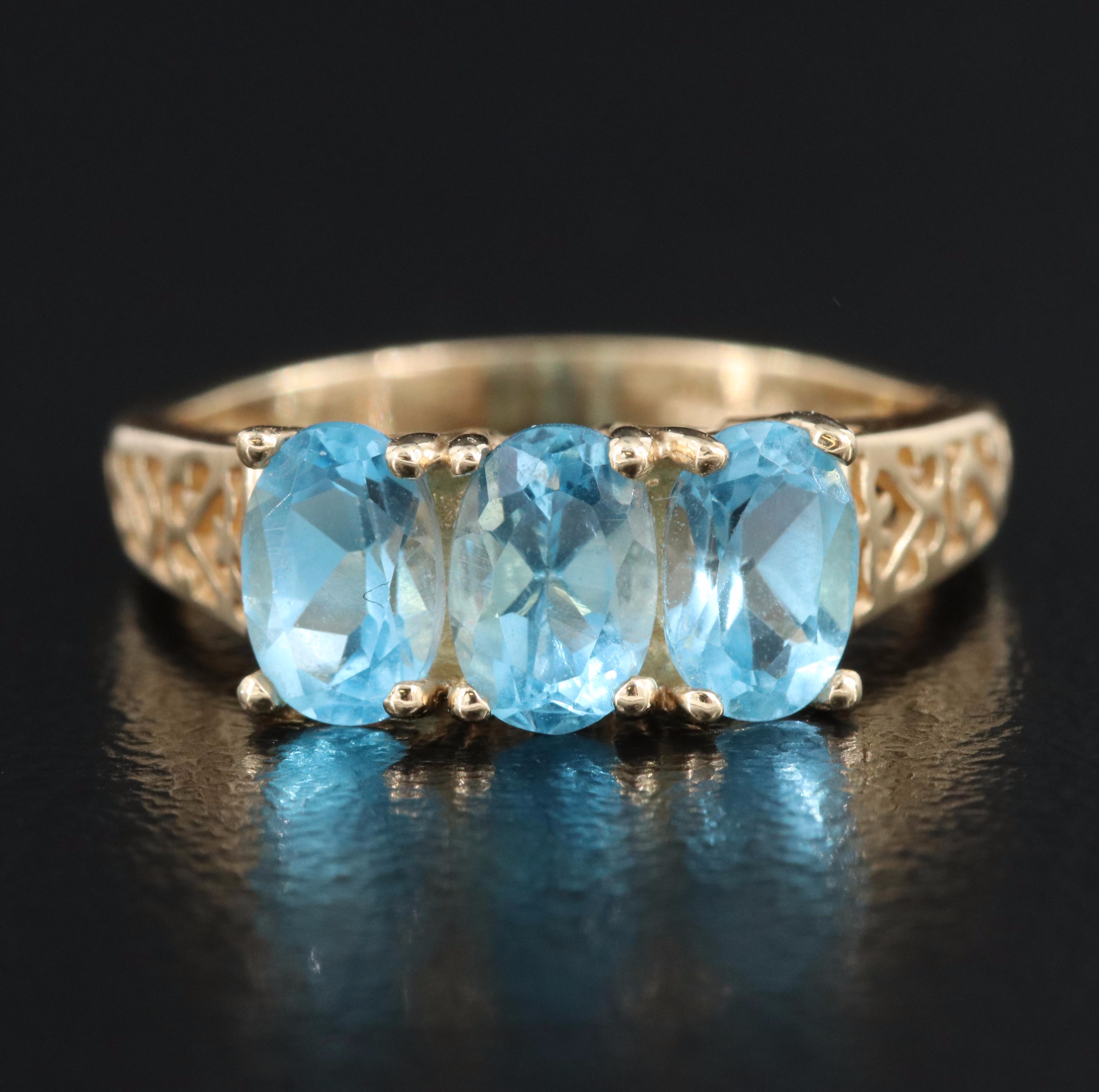 10K Topaz Three Stone Ring