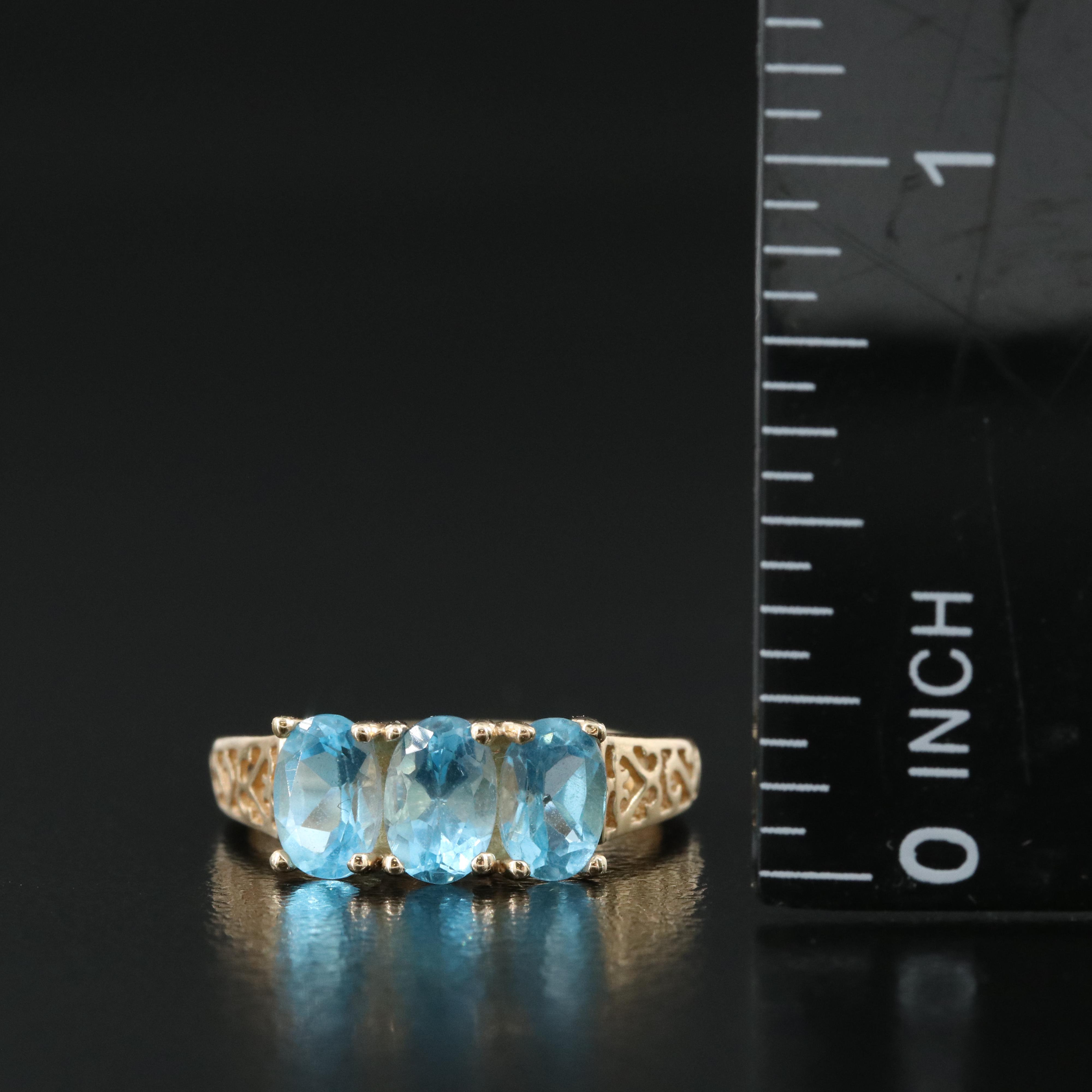 10K Topaz Three Stone Ring