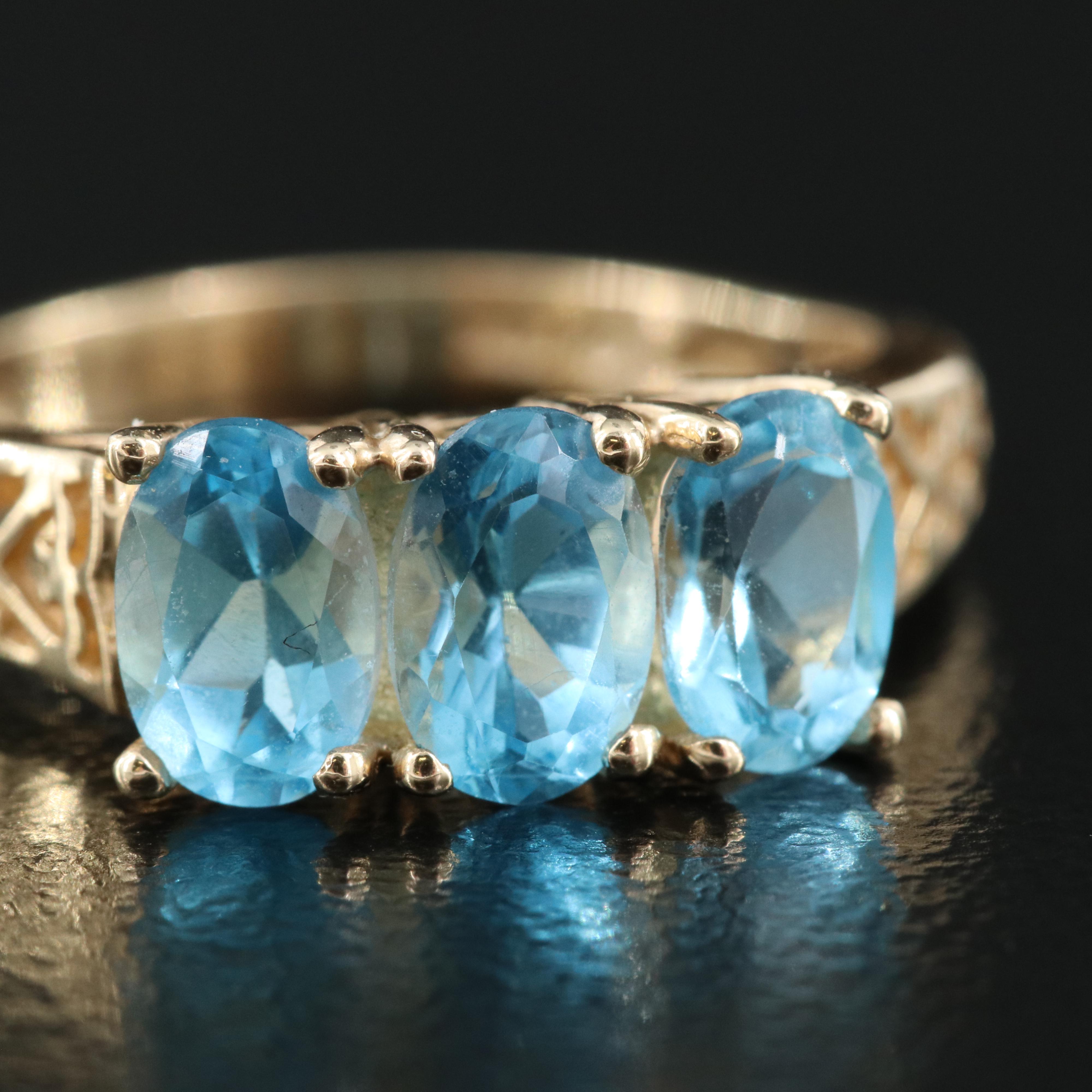 10K Topaz Three Stone Ring