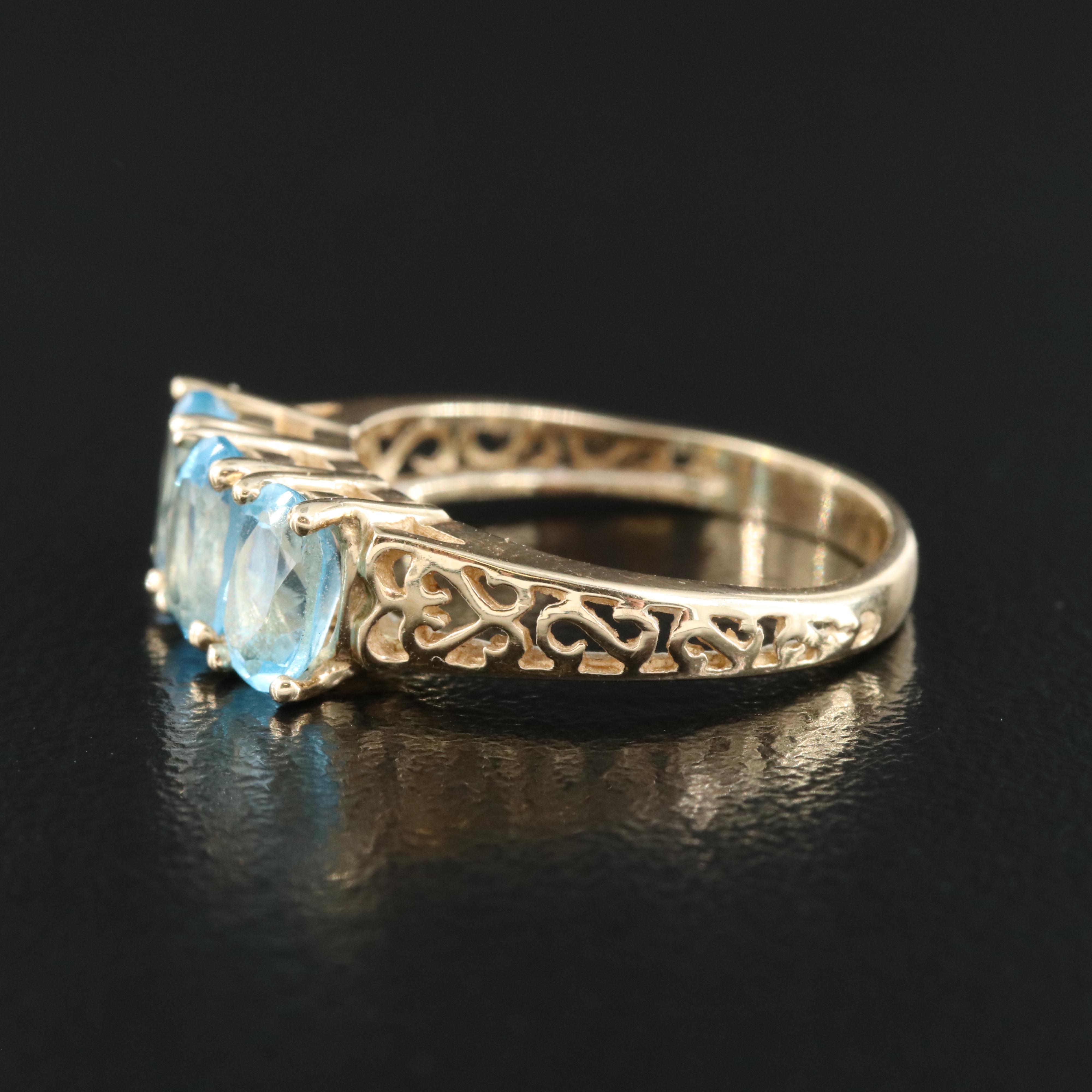 10K Topaz Three Stone Ring