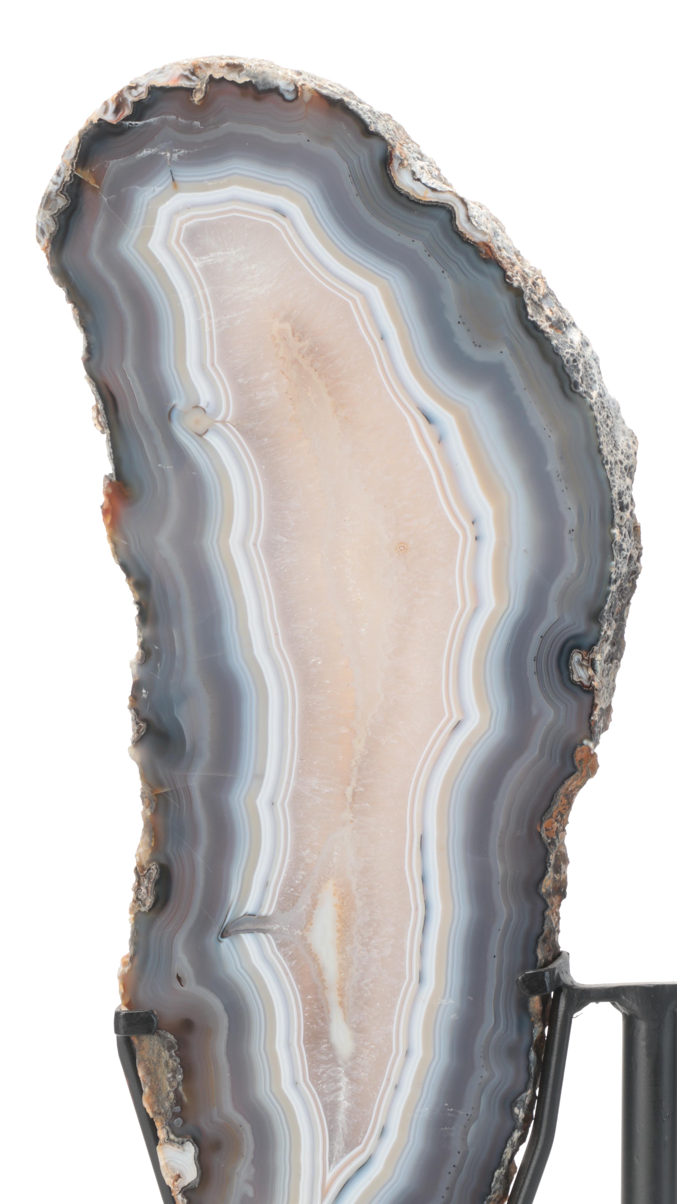 Pair of Banded Agate and Calcite Polished Bookmatched Geode Slabs on Stands