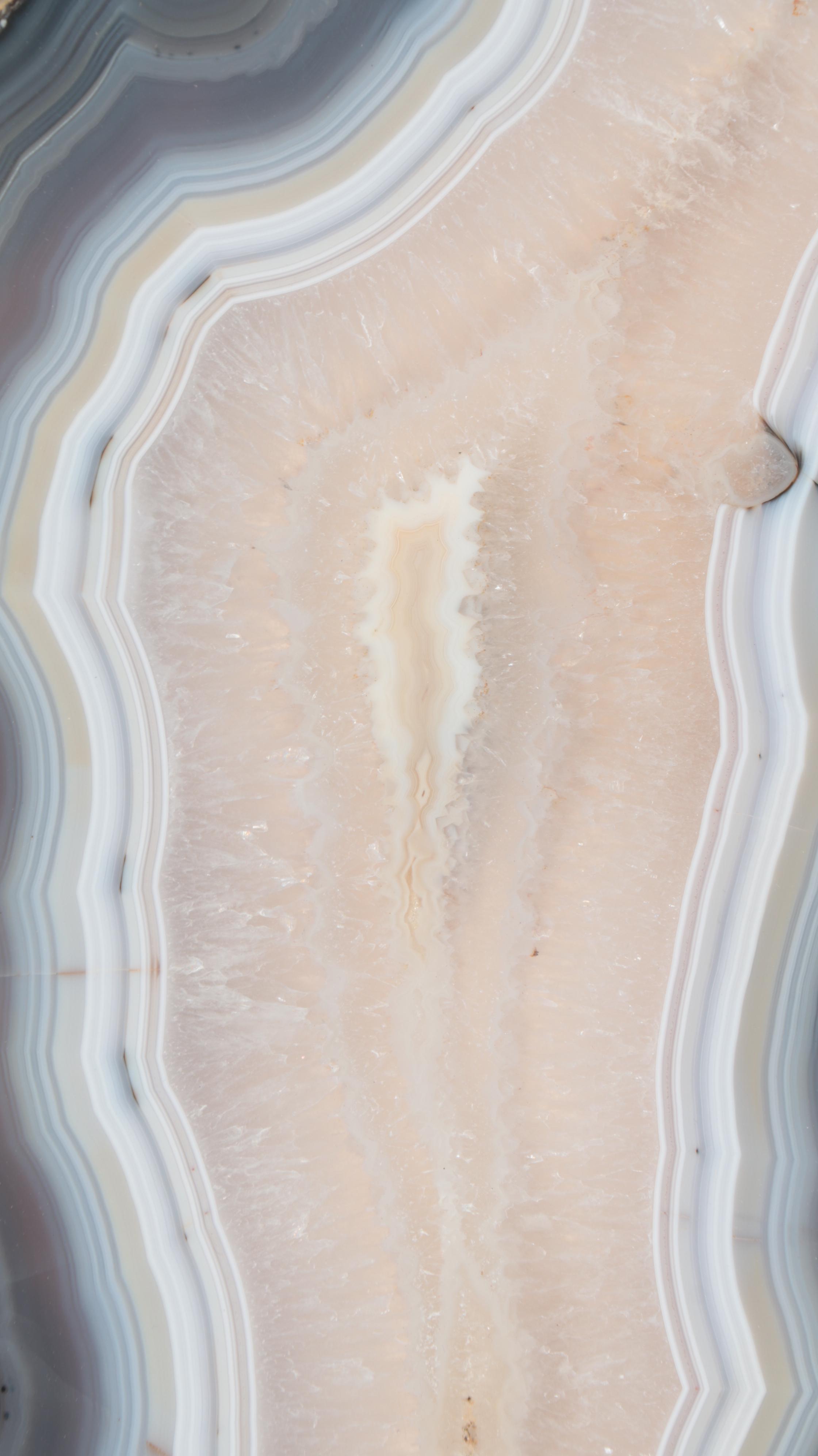 Pair of Banded Agate and Calcite Polished Bookmatched Geode Slabs on Stands