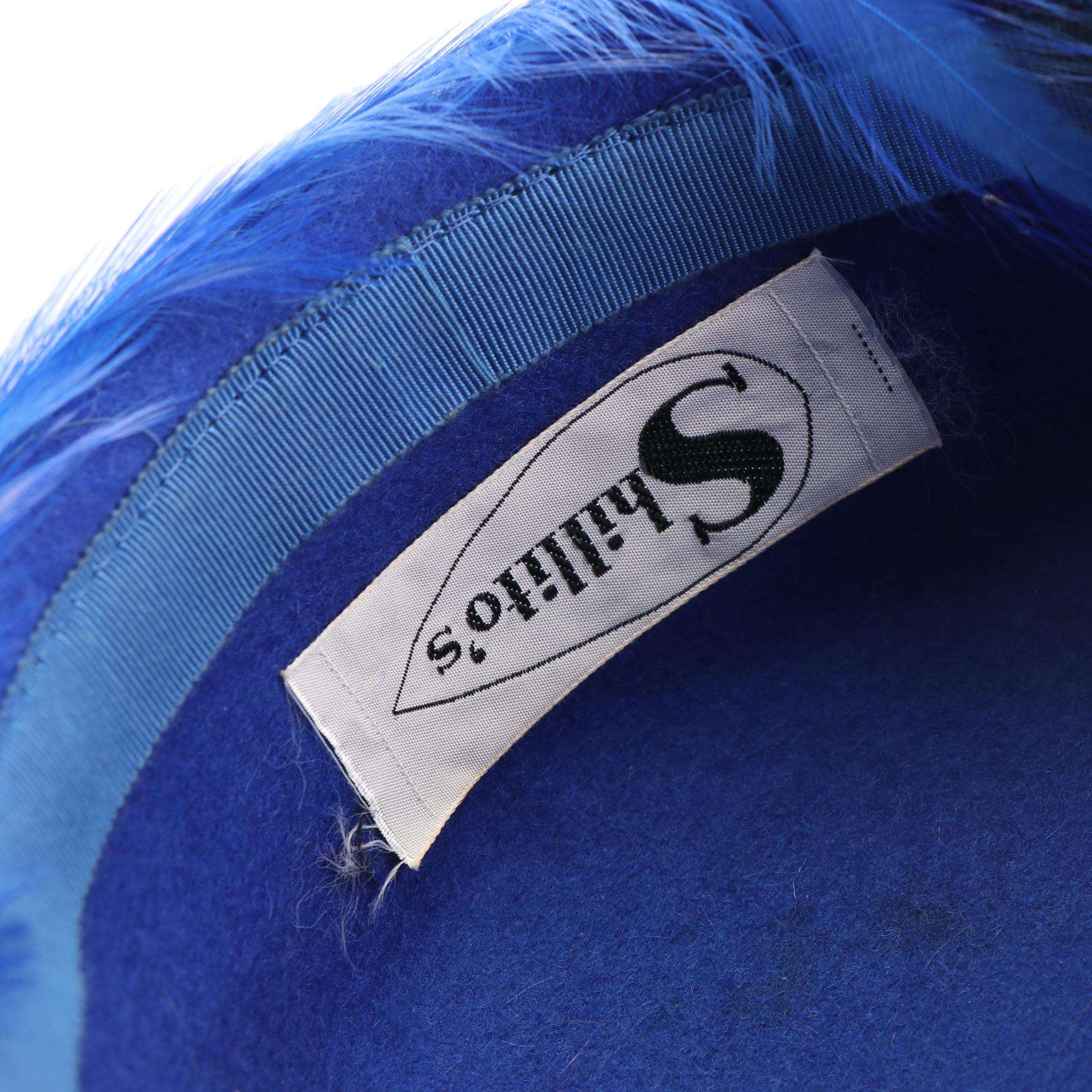 Kumma Style Embroidered Cap and Dyed Feather Bumper Hat