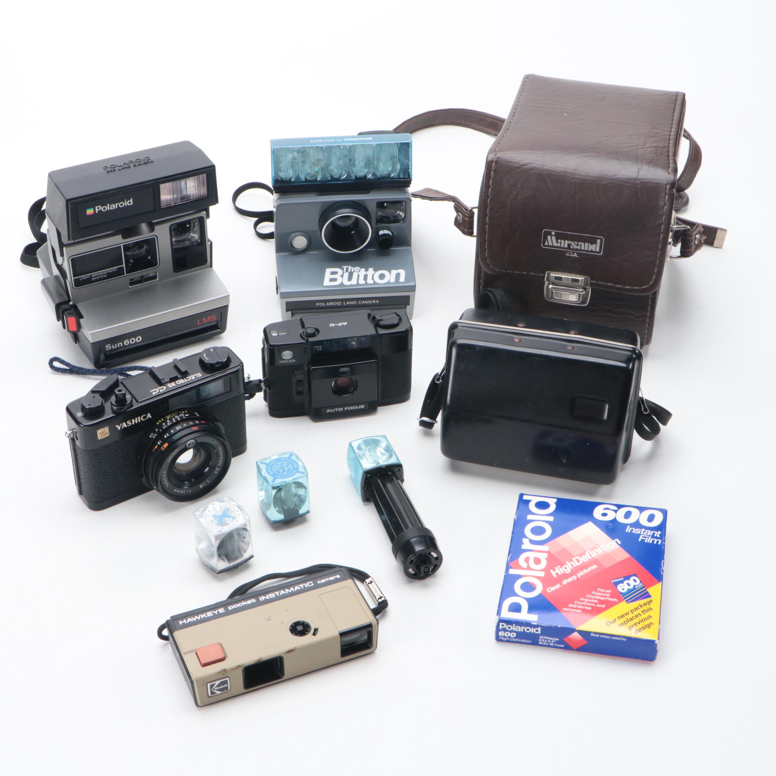 Polaroid Sun 600 and SX-70 Instant Film Camera with More Cameras and Accessories