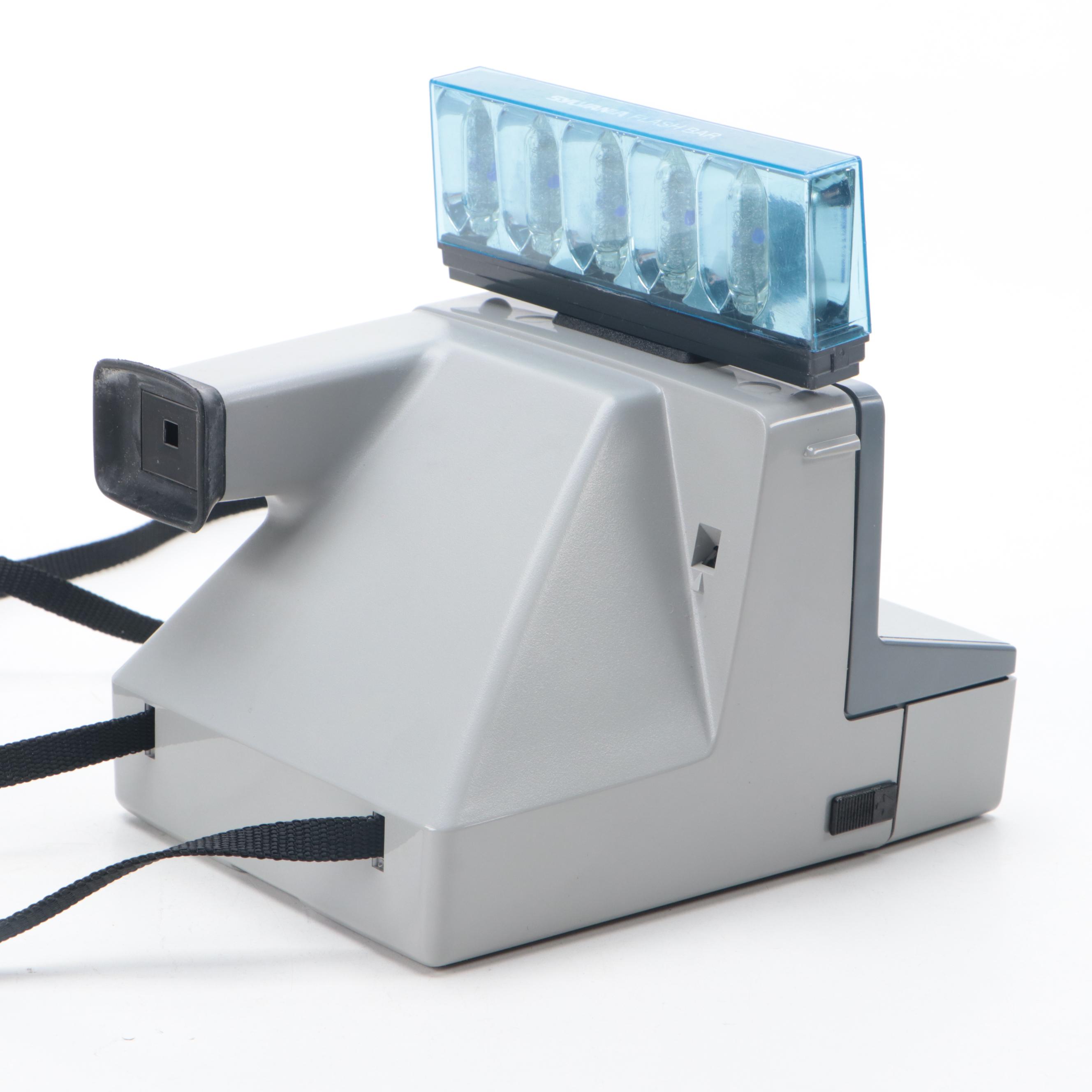 Polaroid Sun 600 and SX-70 Instant Film Camera with More Cameras and Accessories