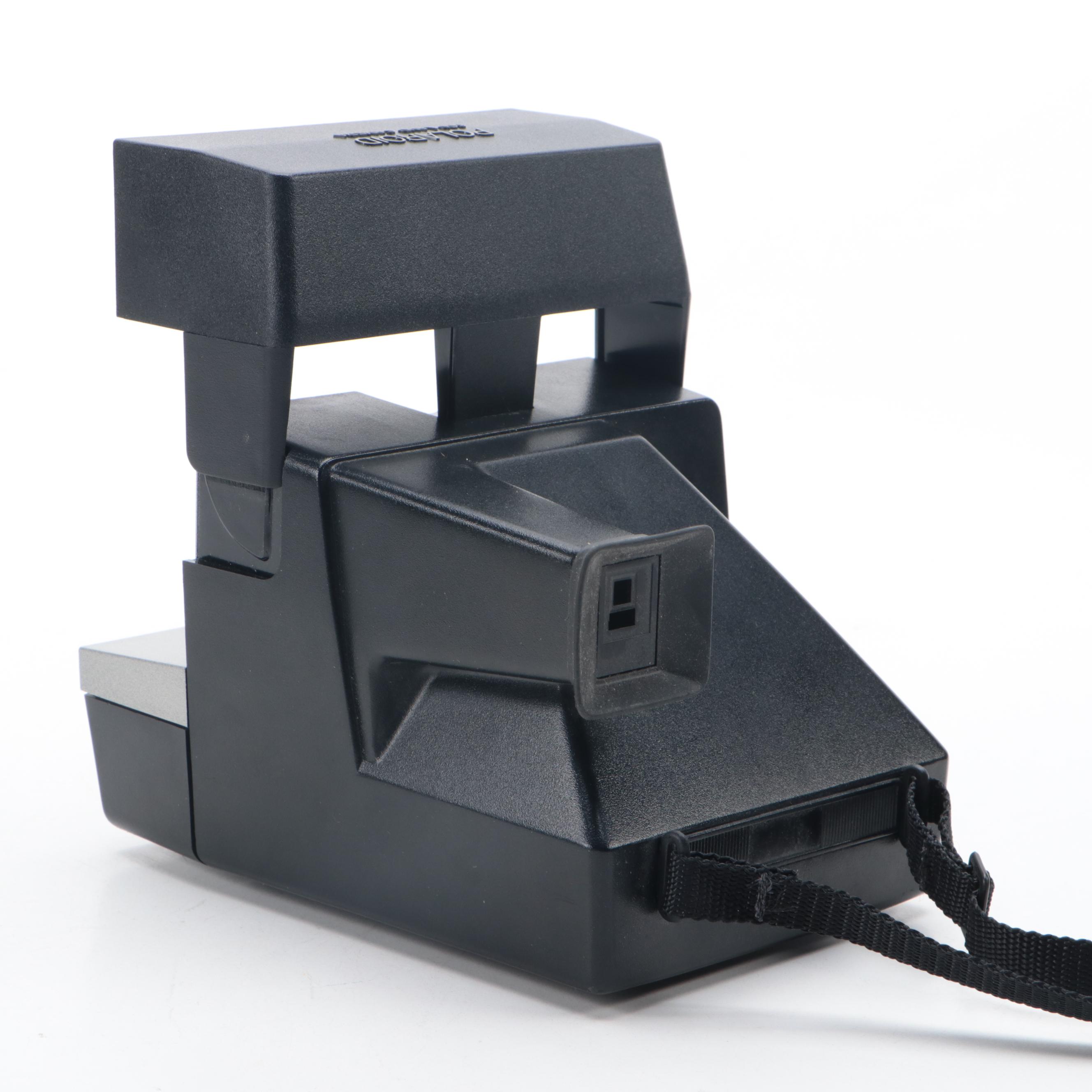 Polaroid Sun 600 and SX-70 Instant Film Camera with More Cameras and Accessories