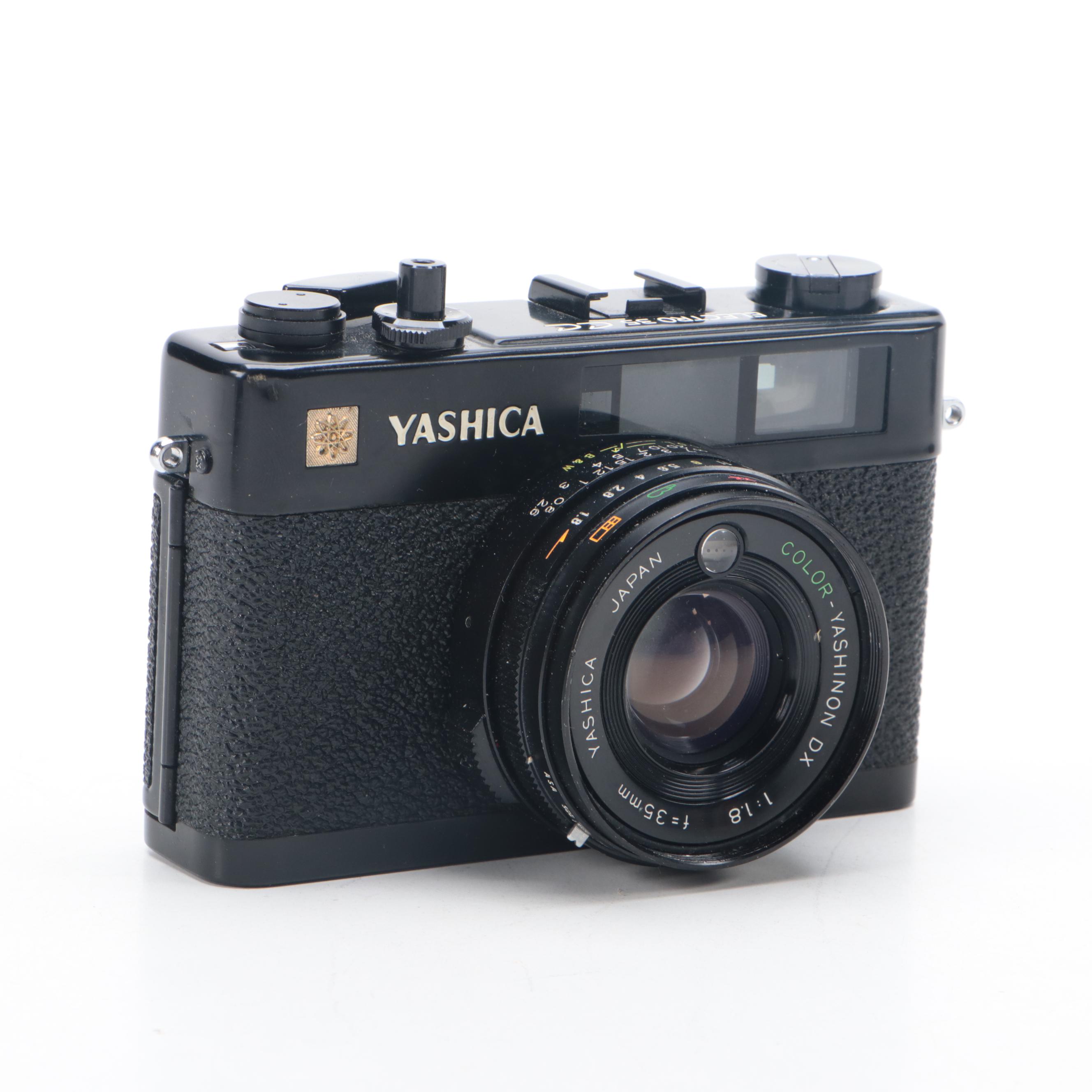 Polaroid Sun 600 and SX-70 Instant Film Camera with More Cameras and Accessories