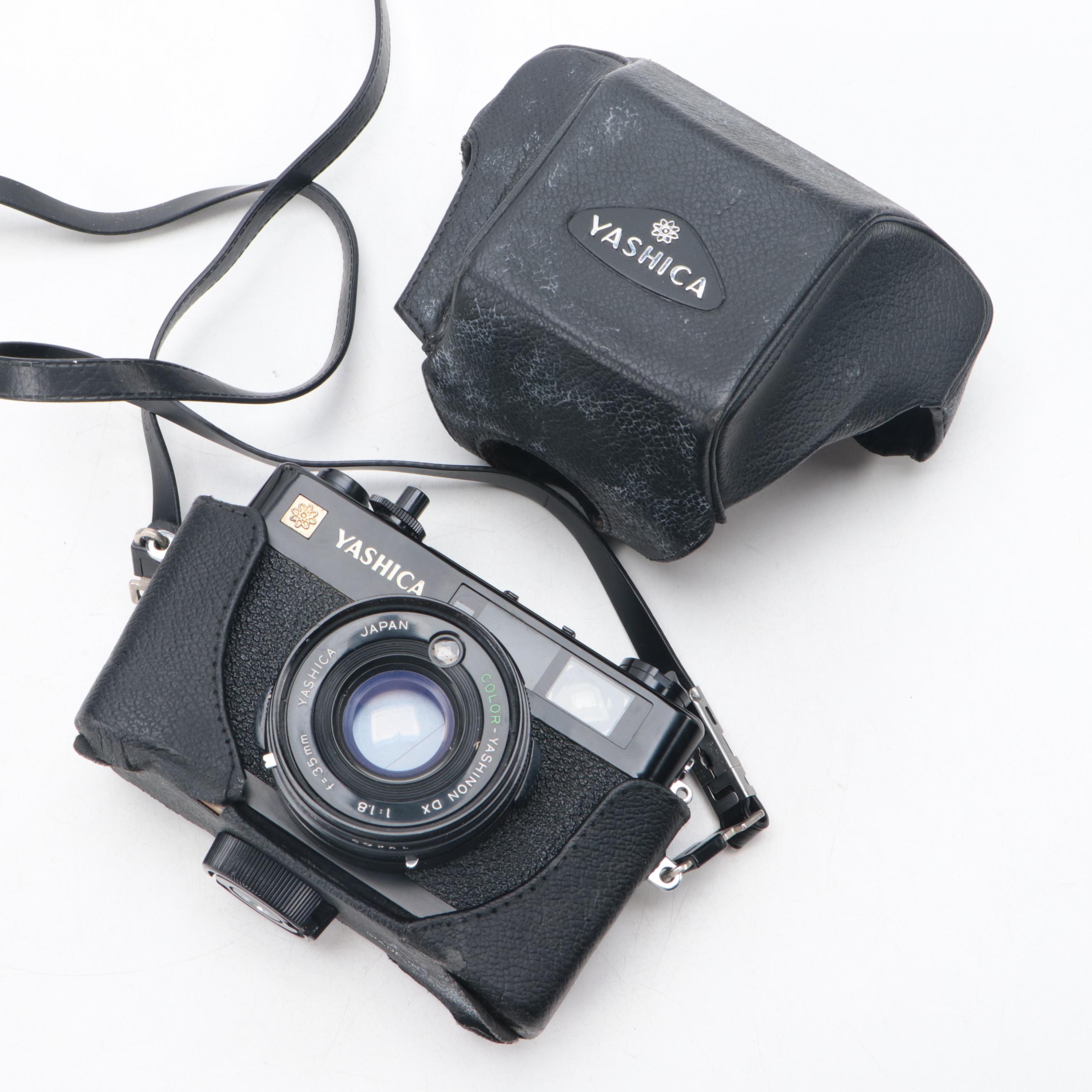 Polaroid Sun 600 and SX-70 Instant Film Camera with More Cameras and Accessories