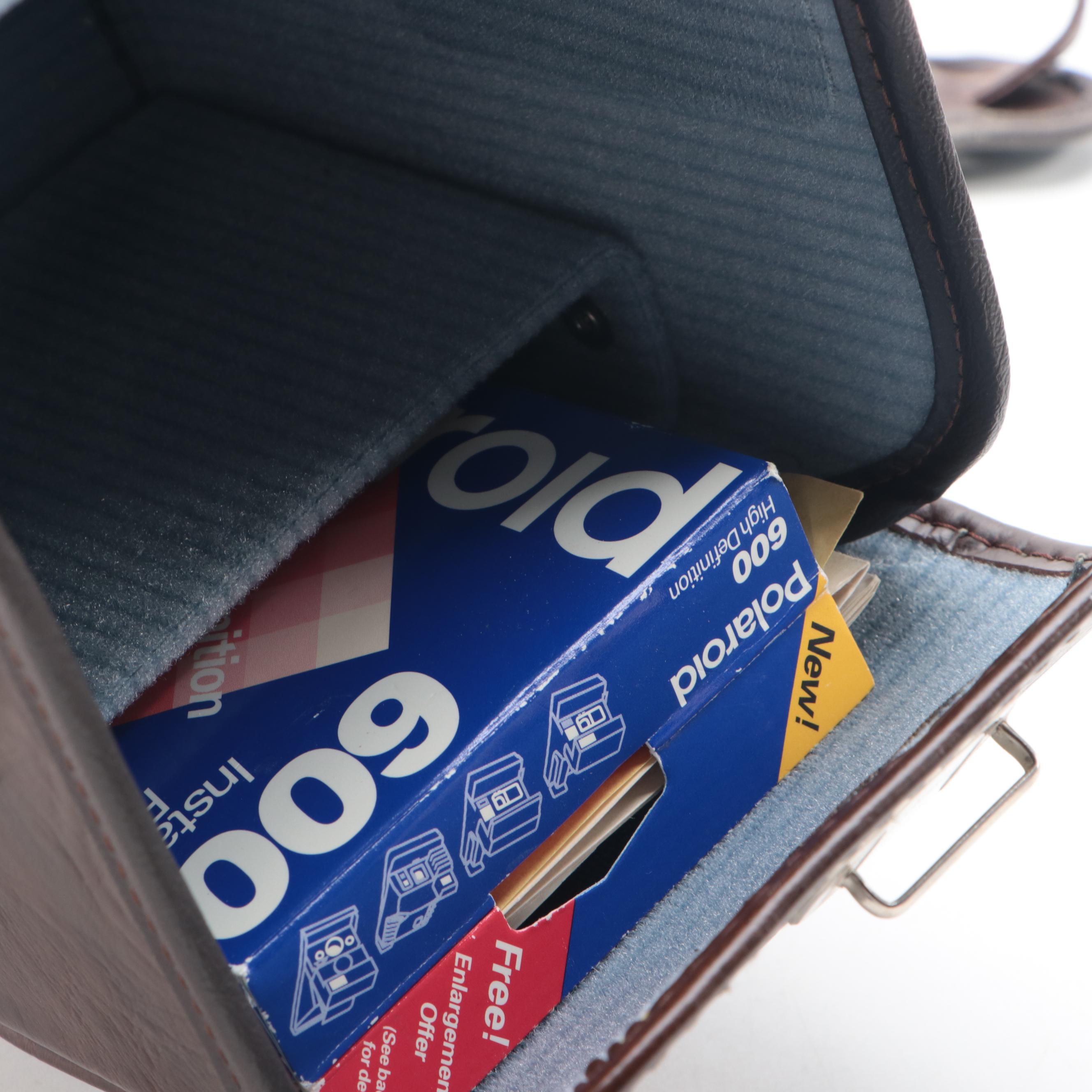 Polaroid Sun 600 and SX-70 Instant Film Camera with More Cameras and Accessories