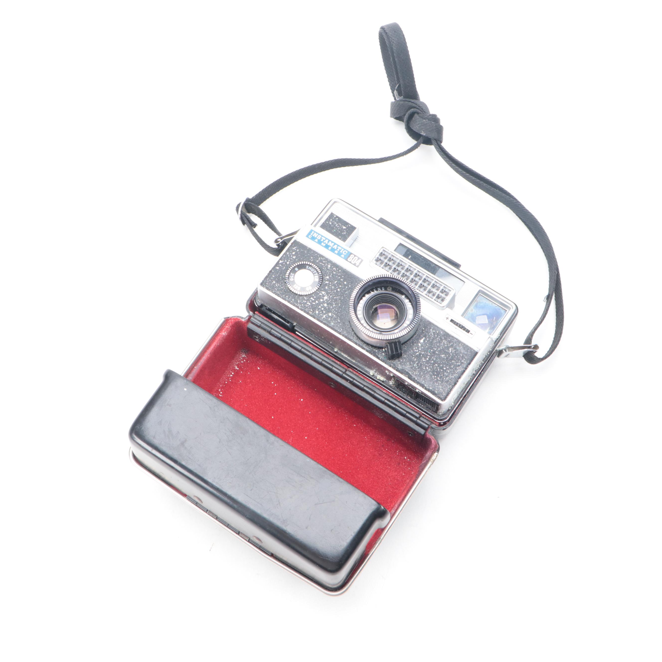 Polaroid Sun 600 and SX-70 Instant Film Camera with More Cameras and Accessories