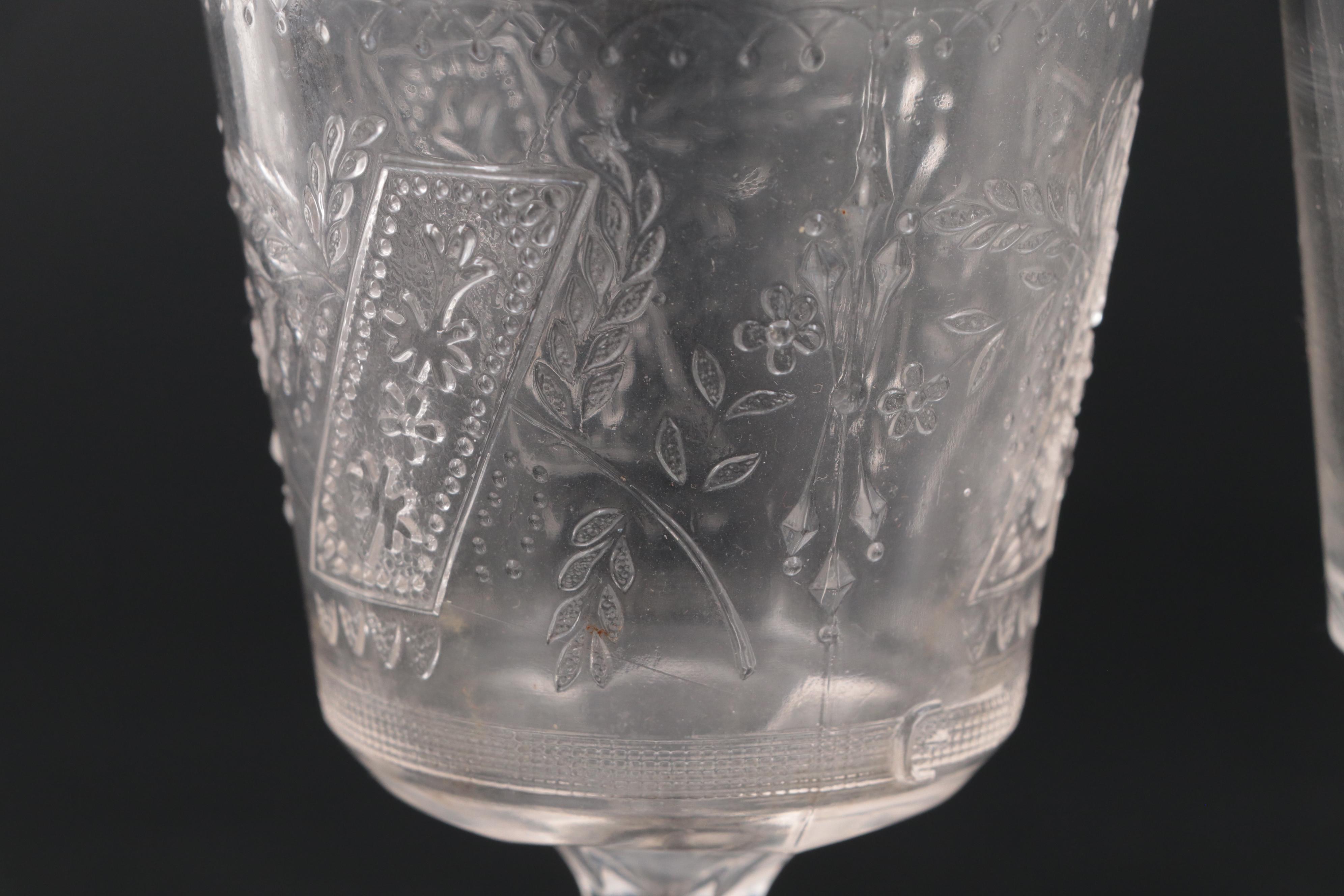 Duncan and Miller "Three Faces" Glass Water Goblet with More Table Accessories