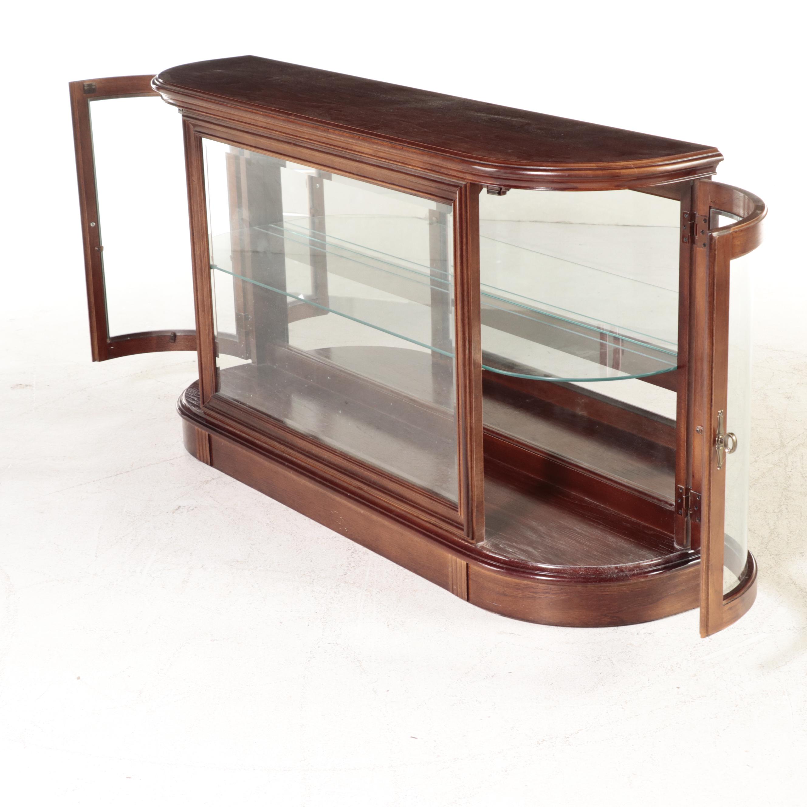 Pulaski Furniture Illuminated Curved End Glass Front Curio Cabinet