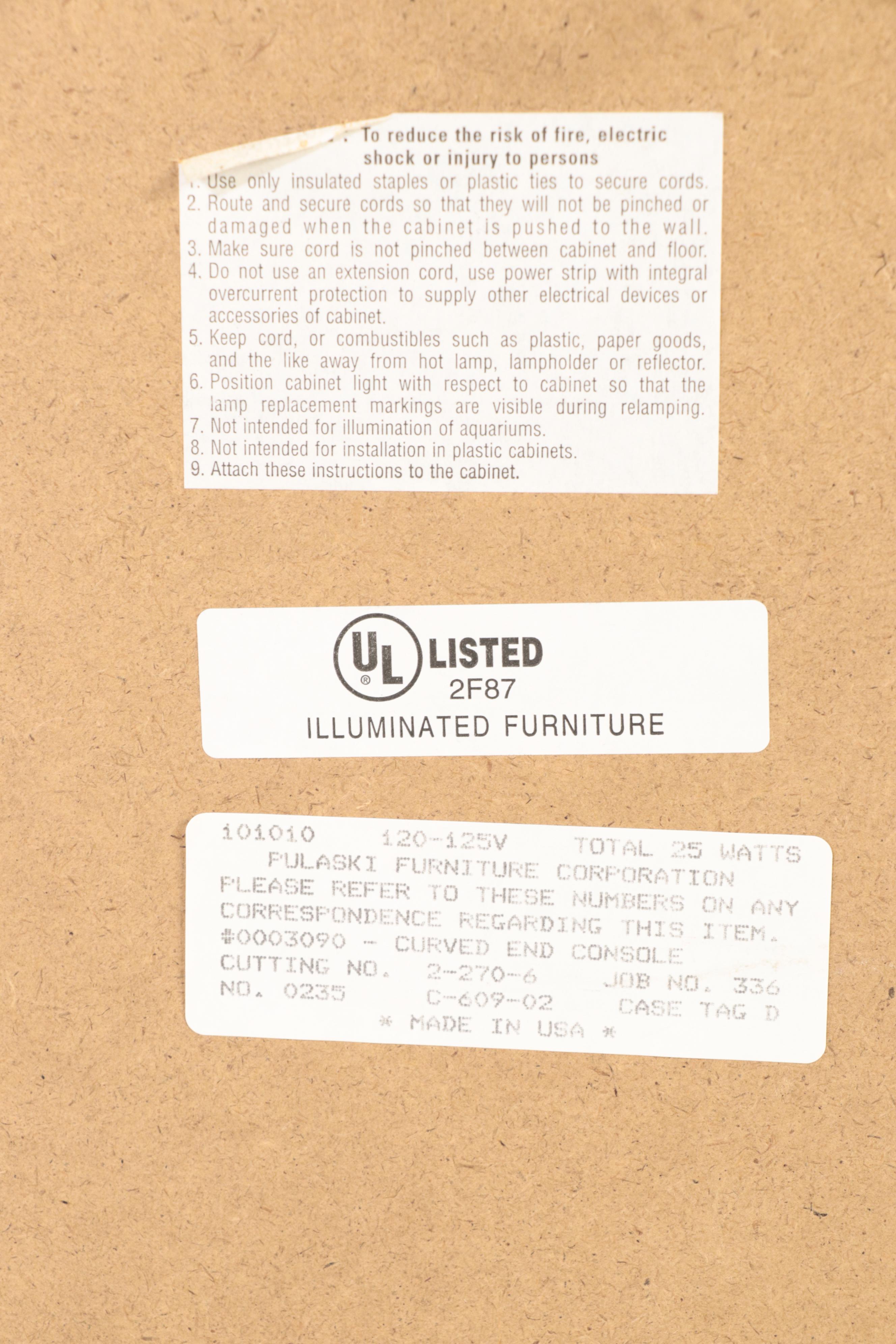 Pulaski Furniture Illuminated Curved End Glass Front Curio Cabinet