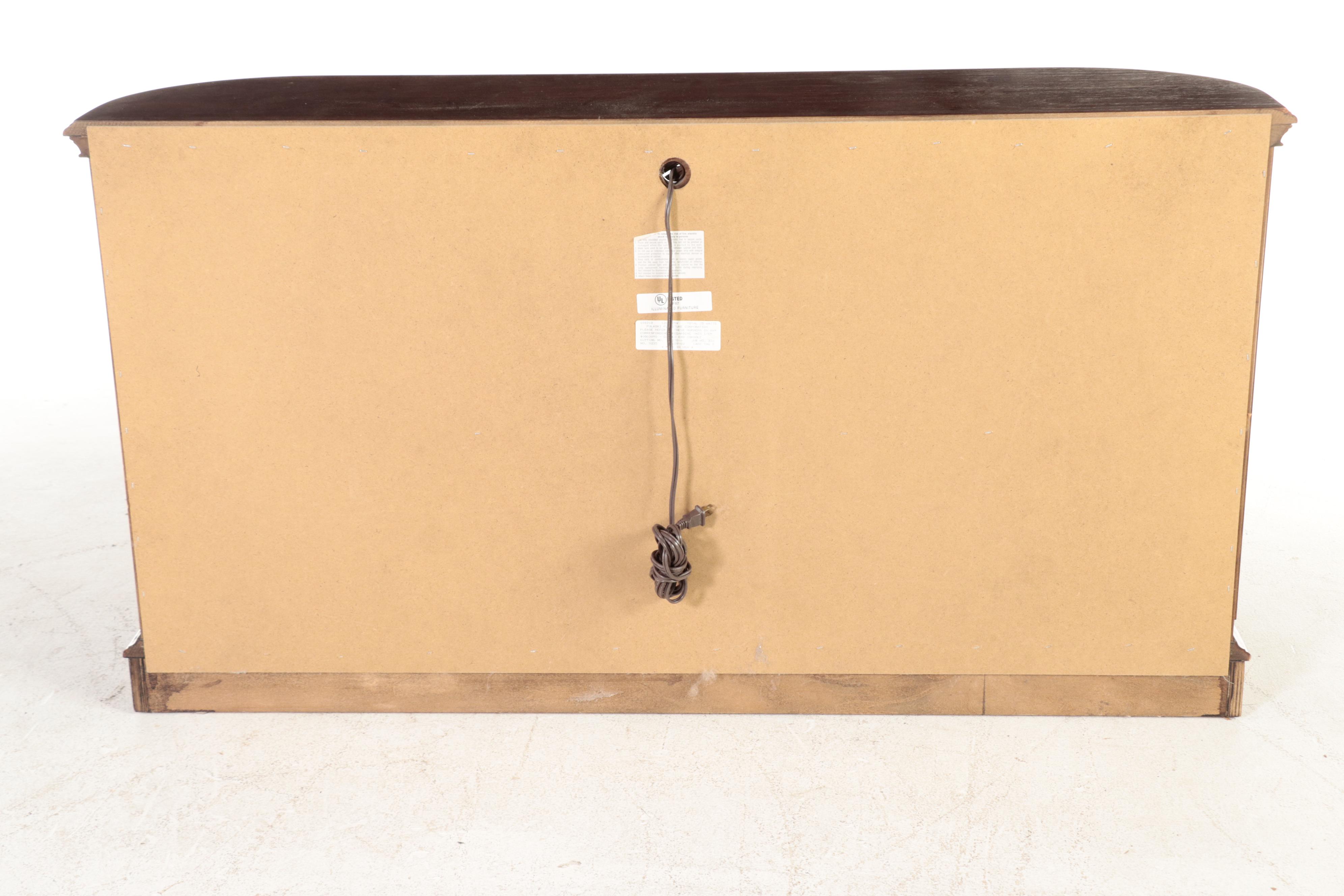 Pulaski Furniture Illuminated Curved End Glass Front Curio Cabinet