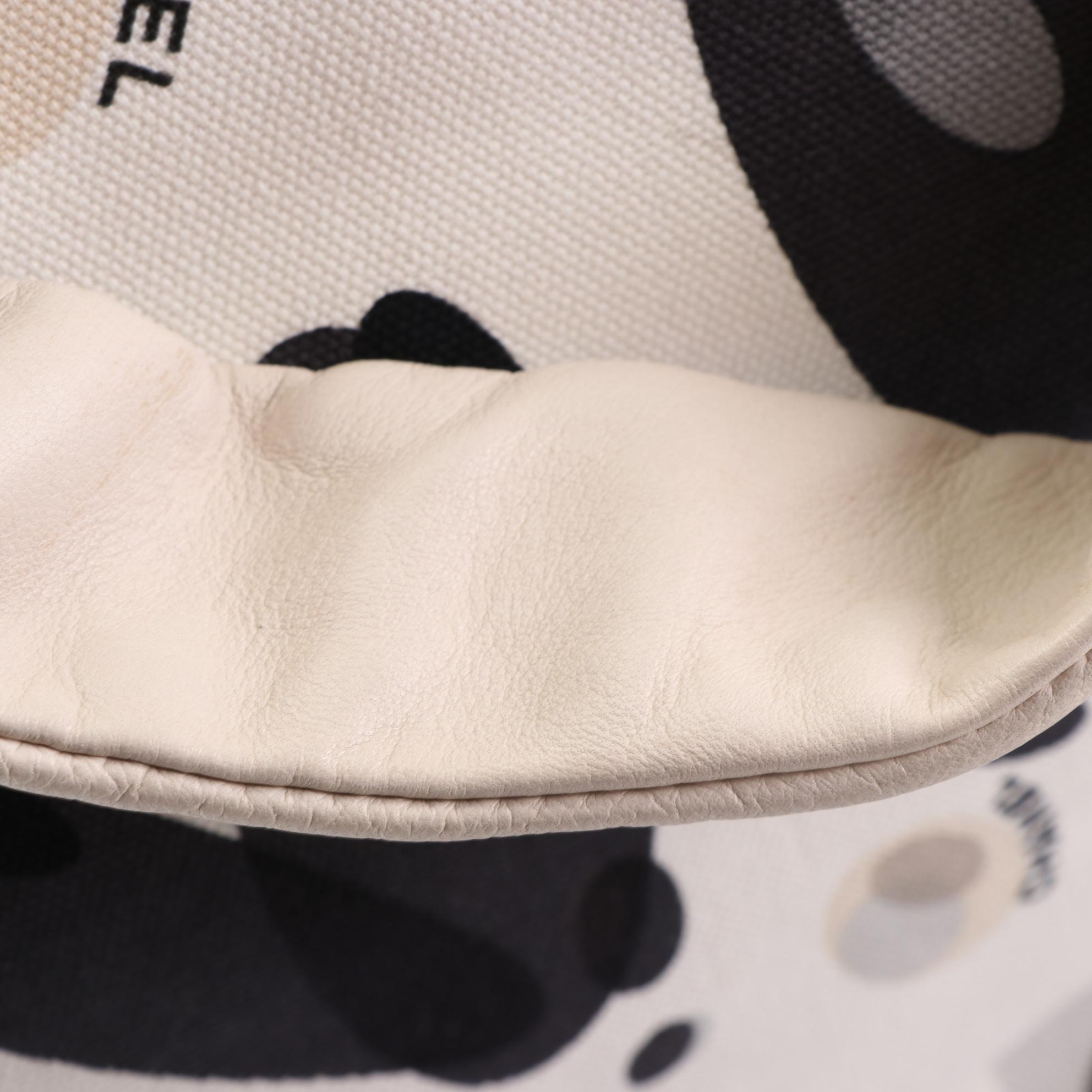 Chanel Front Pocket Tote in Printed Canvas with Lambskin Leather Trim