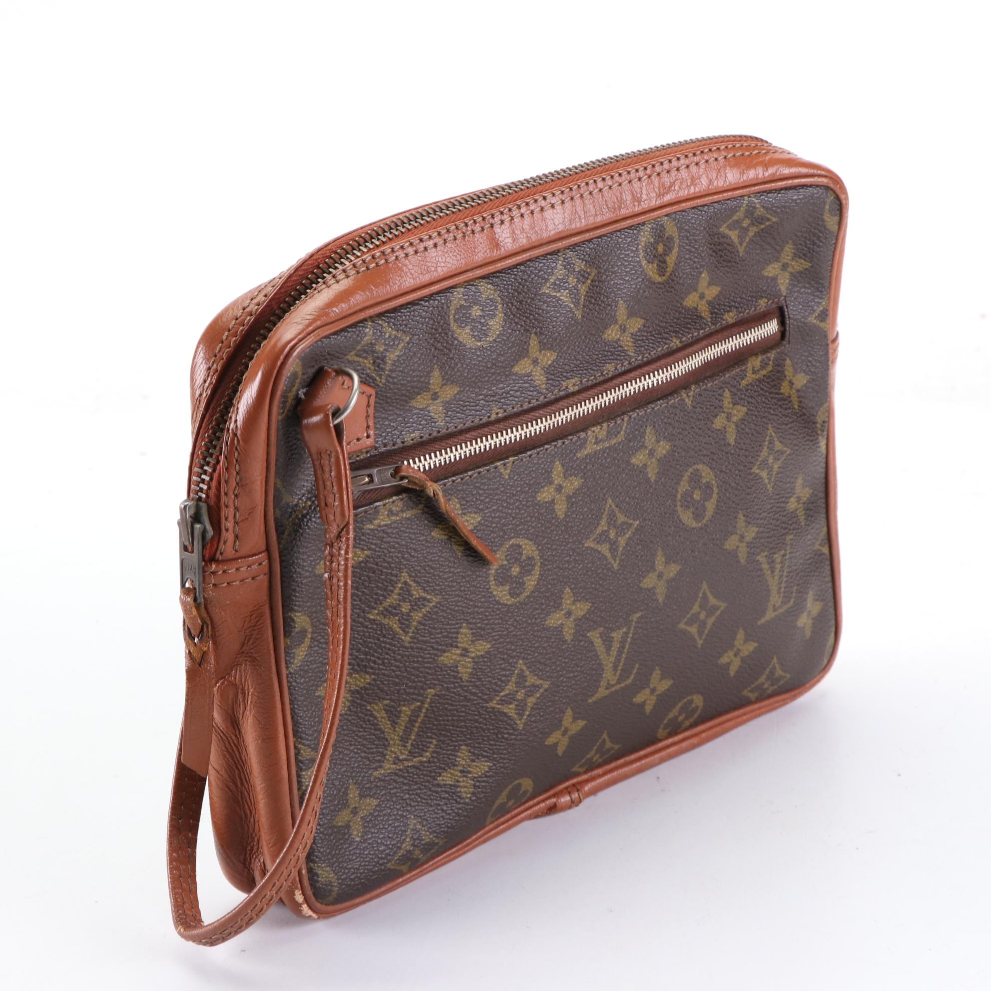 Louis Vuitton Pochette Sports in Monogram Canvas and Leather with Wristlet Strap