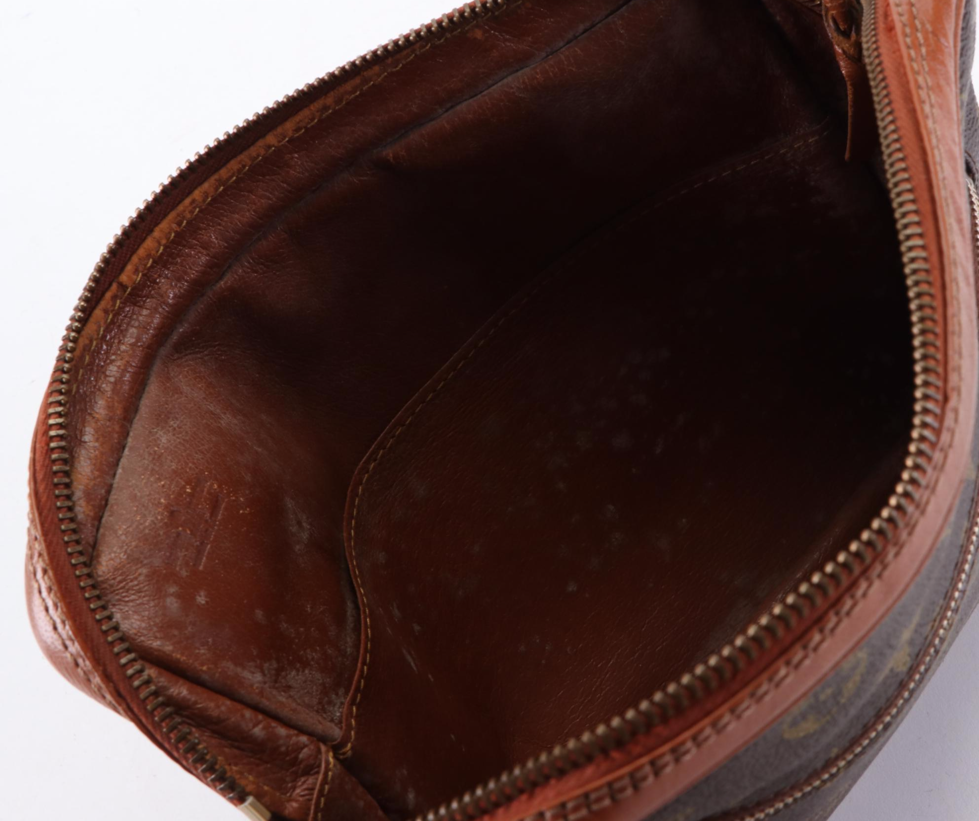 Louis Vuitton Pochette Sports in Monogram Canvas and Leather with Wristlet Strap