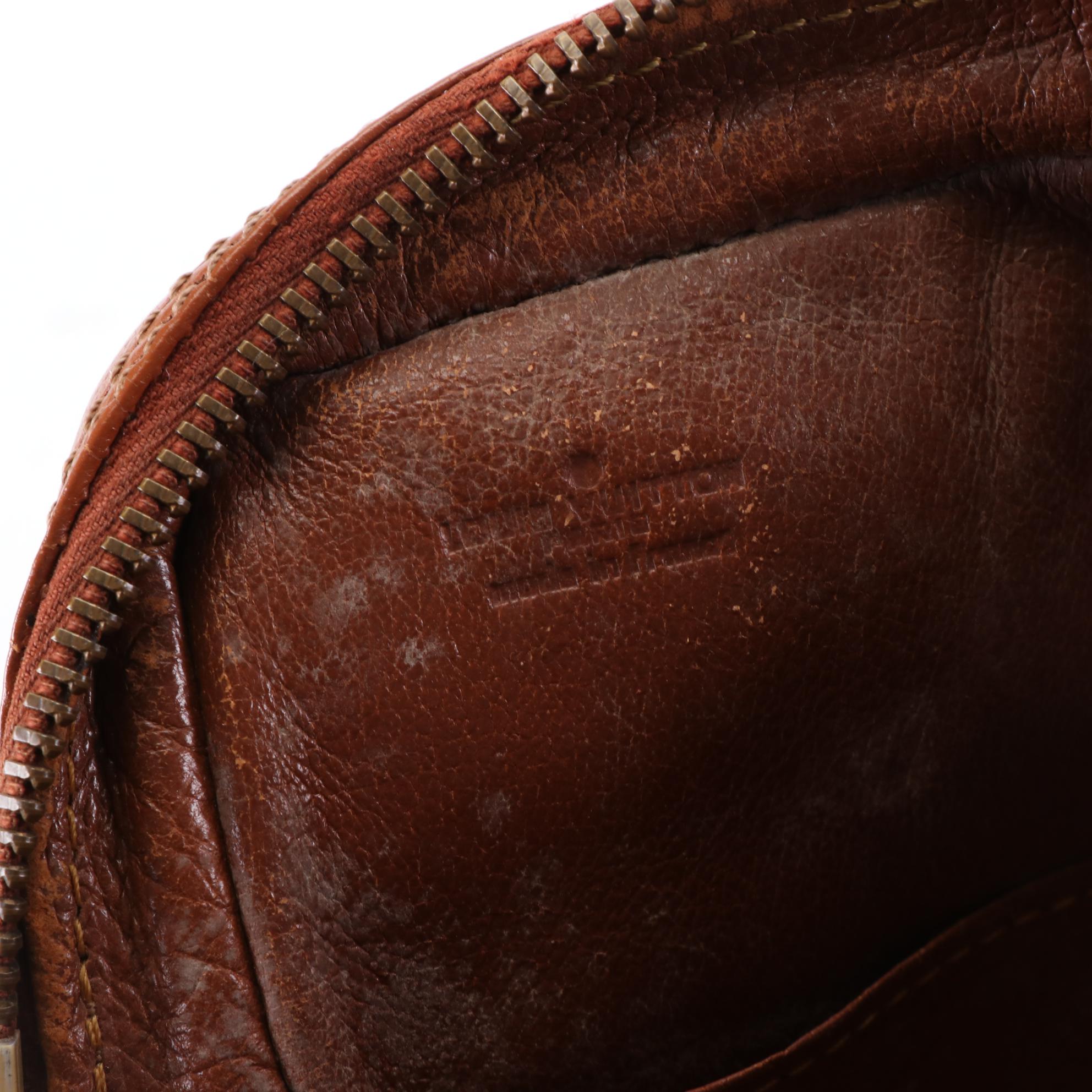 Louis Vuitton Pochette Sports in Monogram Canvas and Leather with Wristlet Strap