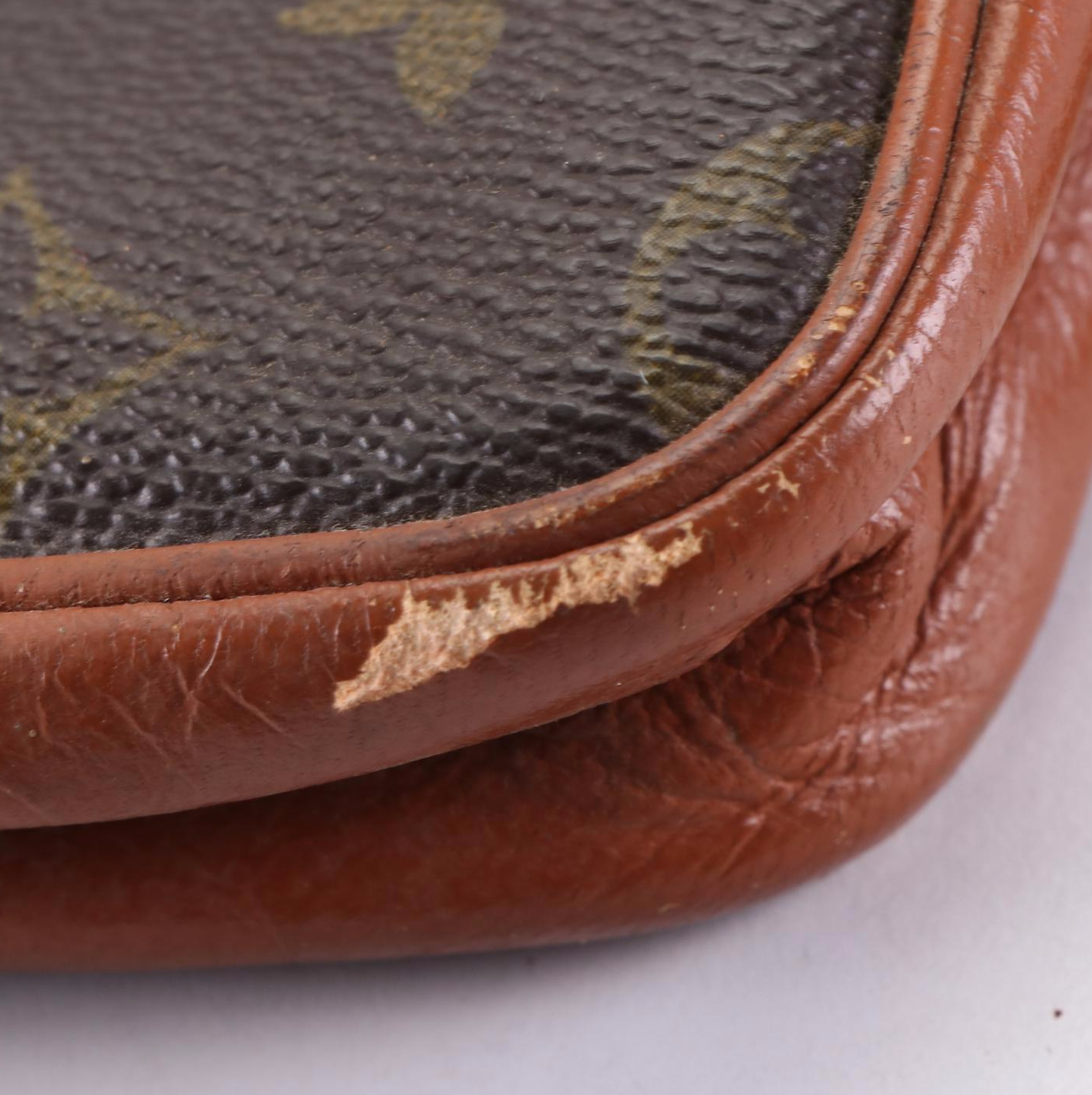 Louis Vuitton Pochette Sports in Monogram Canvas and Leather with Wristlet Strap