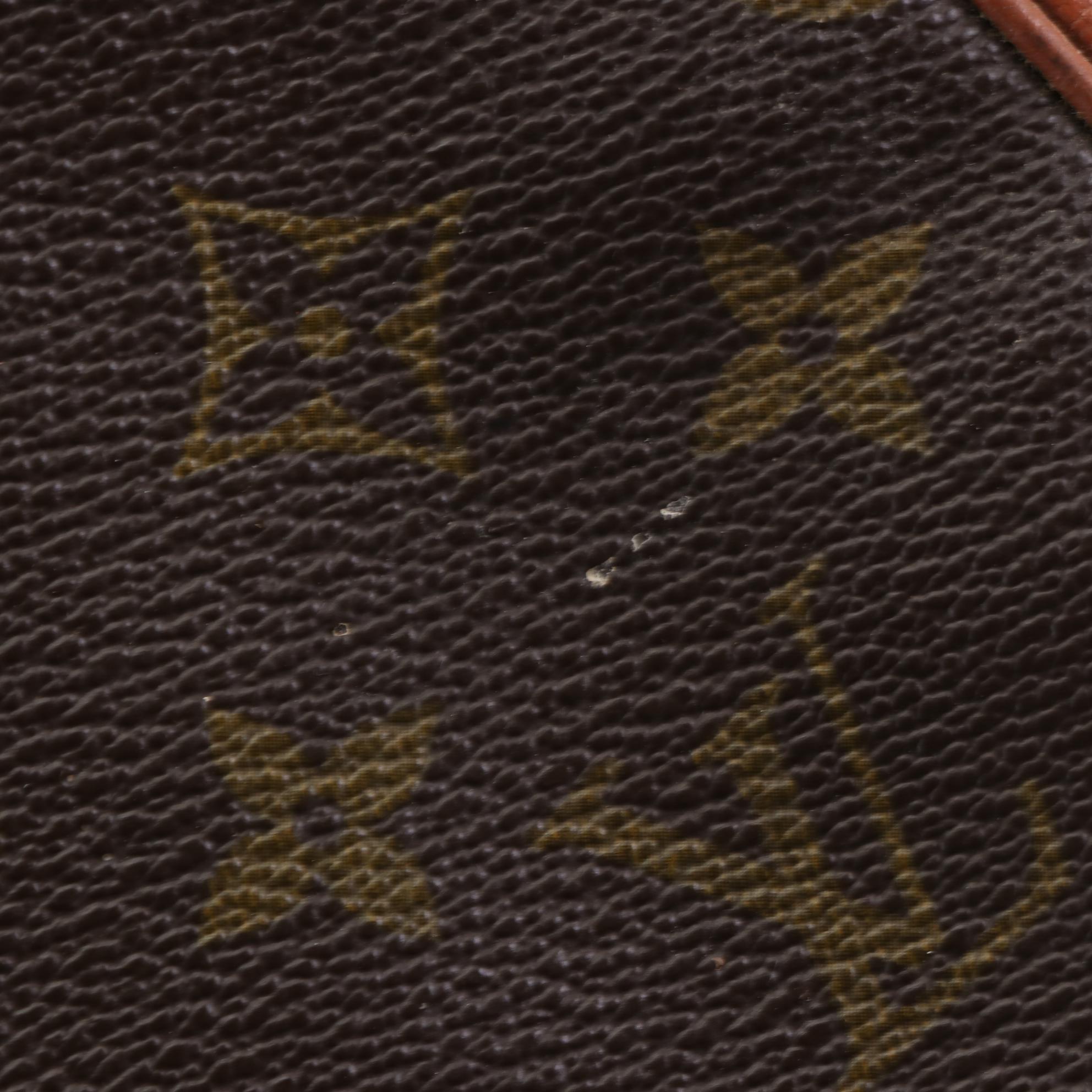 Louis Vuitton Pochette Sports in Monogram Canvas and Leather with Wristlet Strap