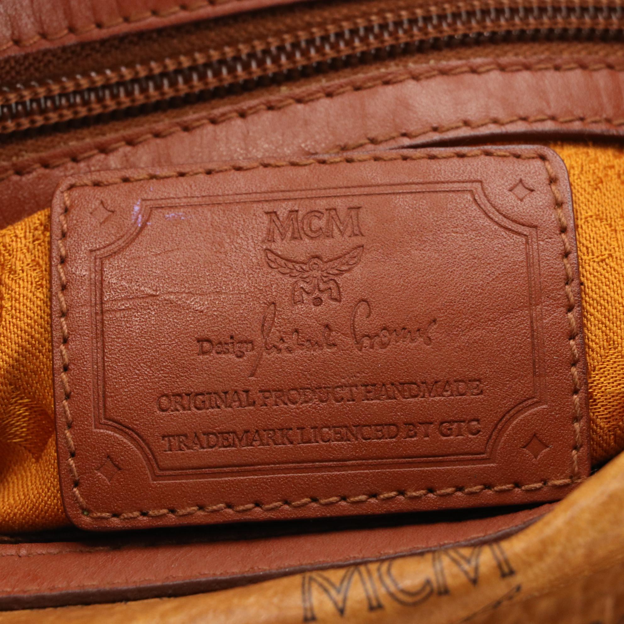MCM Golf Collection Small Boston Bag in Cognac Visetos Monogram Canvas