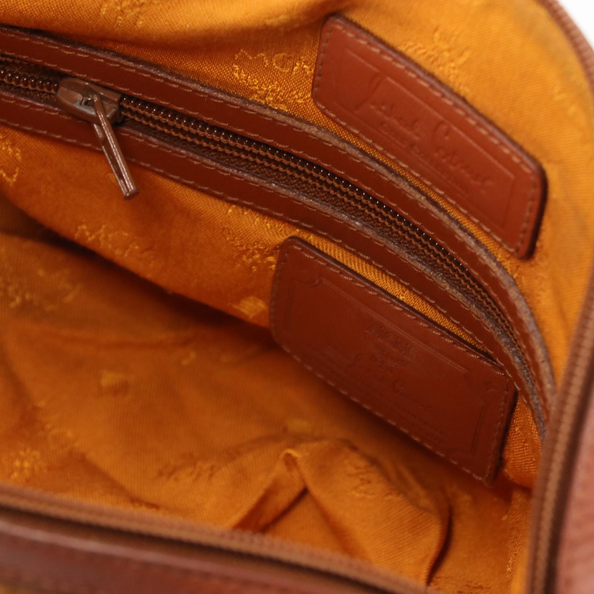 MCM Golf Collection Small Boston Bag in Cognac Visetos Monogram Canvas