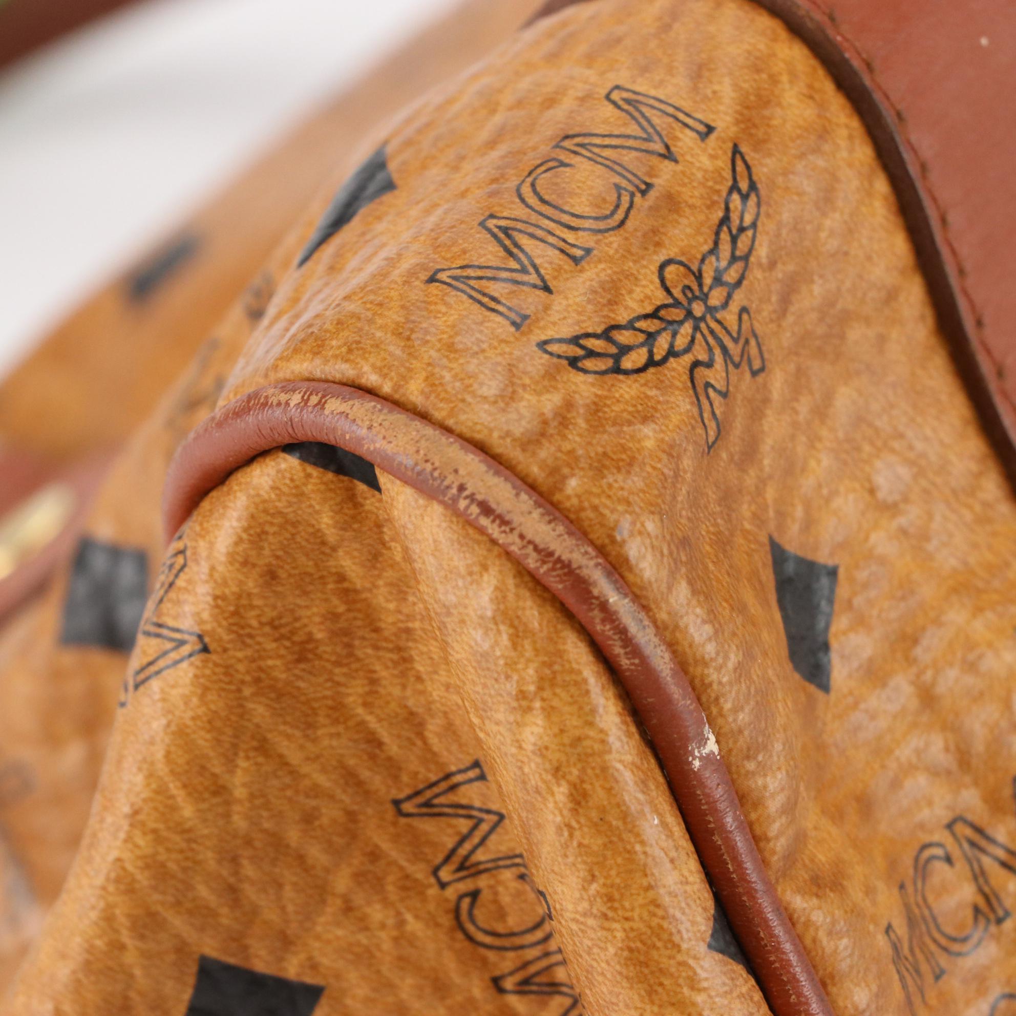 MCM Golf Collection Small Boston Bag in Cognac Visetos Monogram Canvas