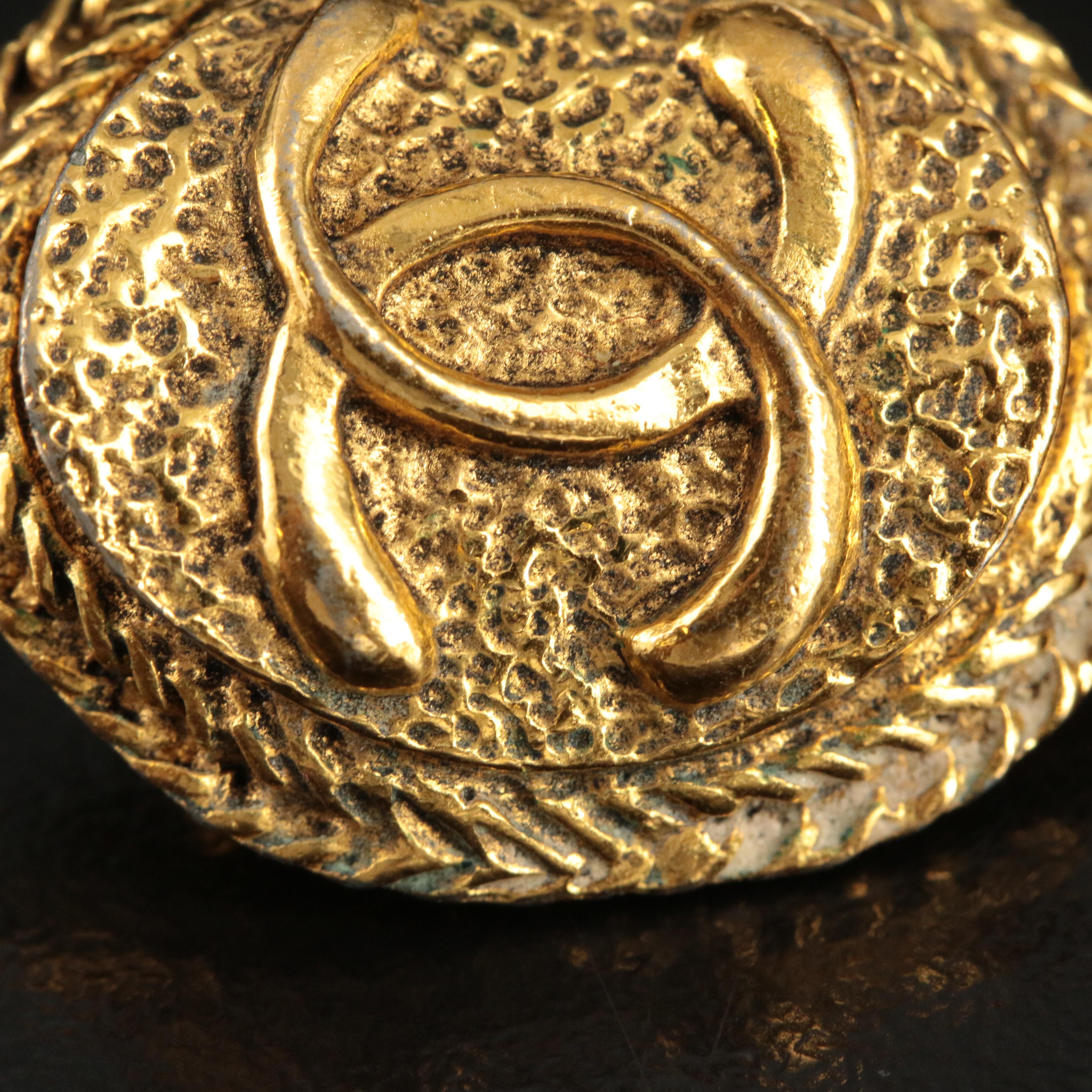 1970s Chanel Textured Oval Logo Clip Earrings